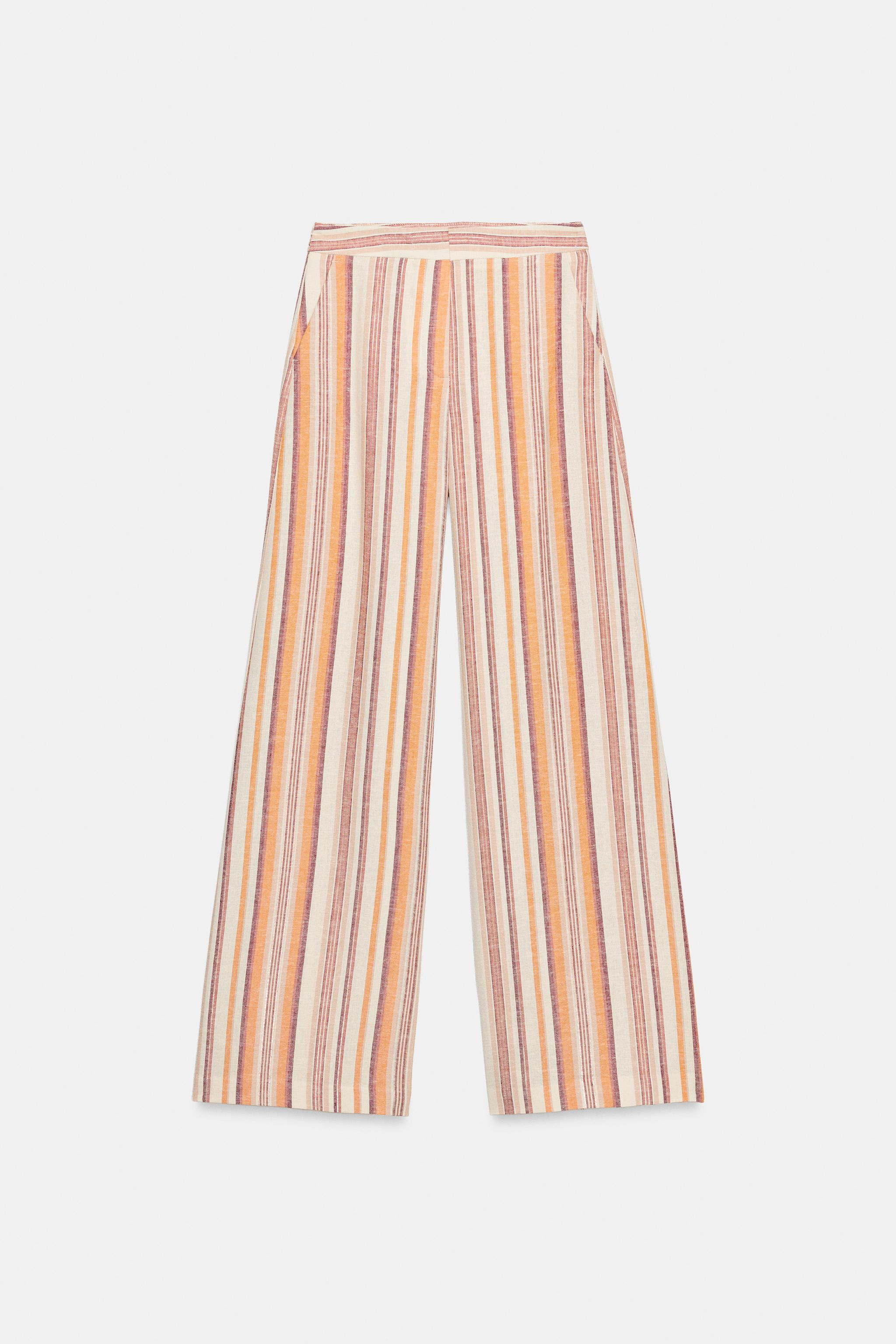 Model height: 176 cmTrousers made of linen and metallic thread. High-waist design with front pock... | Zara UK