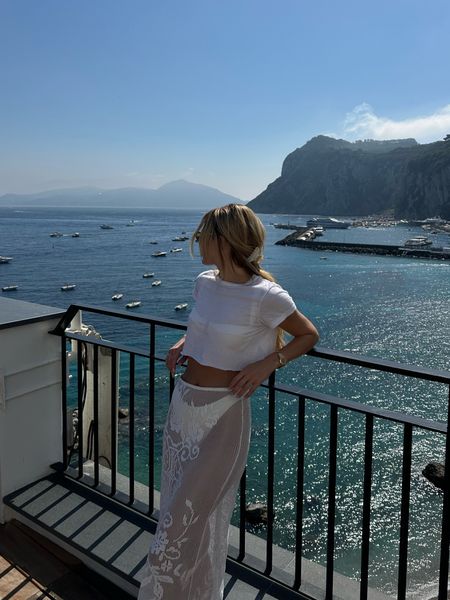 all white summer 🤍 bikini, coverup and cropped tshirt perfect for a boat day, beach club etc. 

Wearing S bikini top and bottom, S tshirt and S skirt but had the skirt taken in 