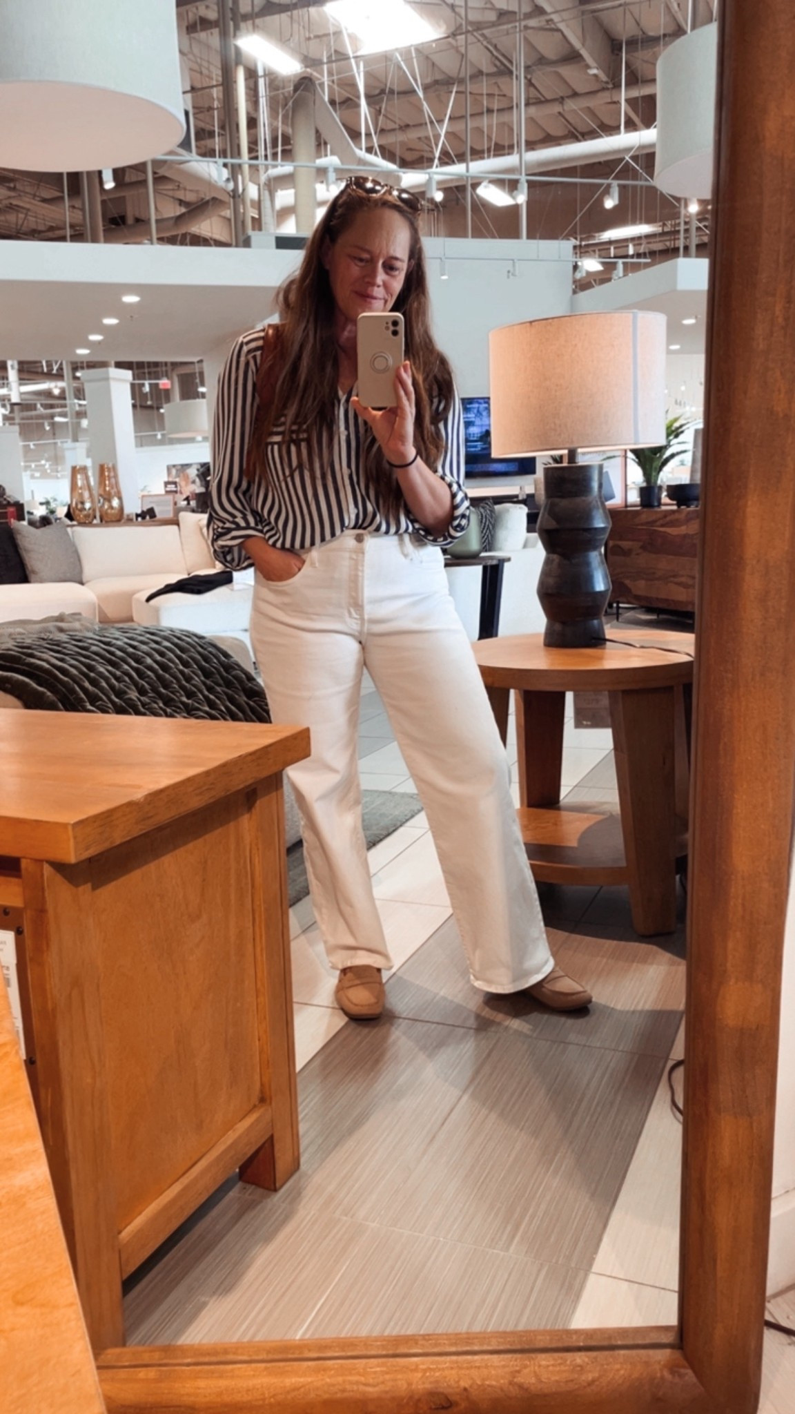 My outfit of the day for a shopping trip to Ashley Home Store. White jeans with my classic blue & white striped button up blouse. 

#LTKOver40 #LTKootd