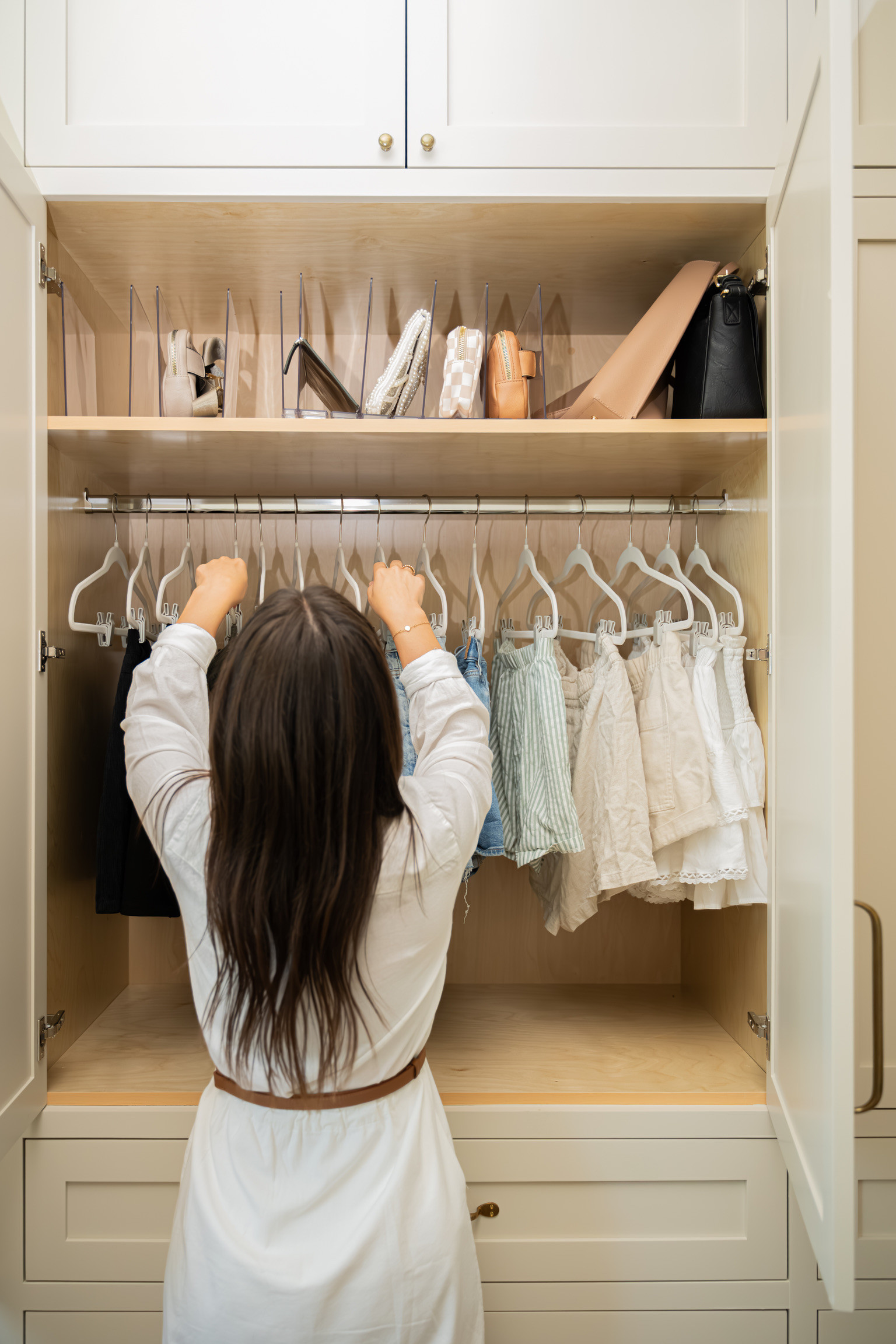 Simple products such as an acrylic purse organizer or flocked, velvet hangers elevate this primary closet from our Cedar & Oak home tour  #LTKFindsUnder50 #LTKFindsUnder100

#LTKHome