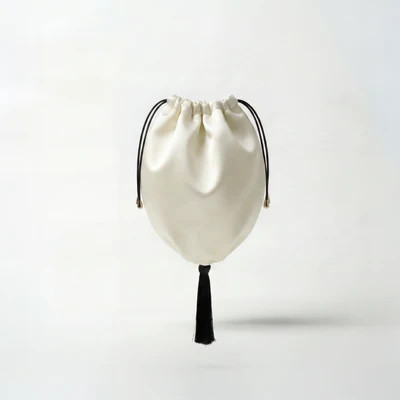 Ivory silk bag with tassel | Mari B
