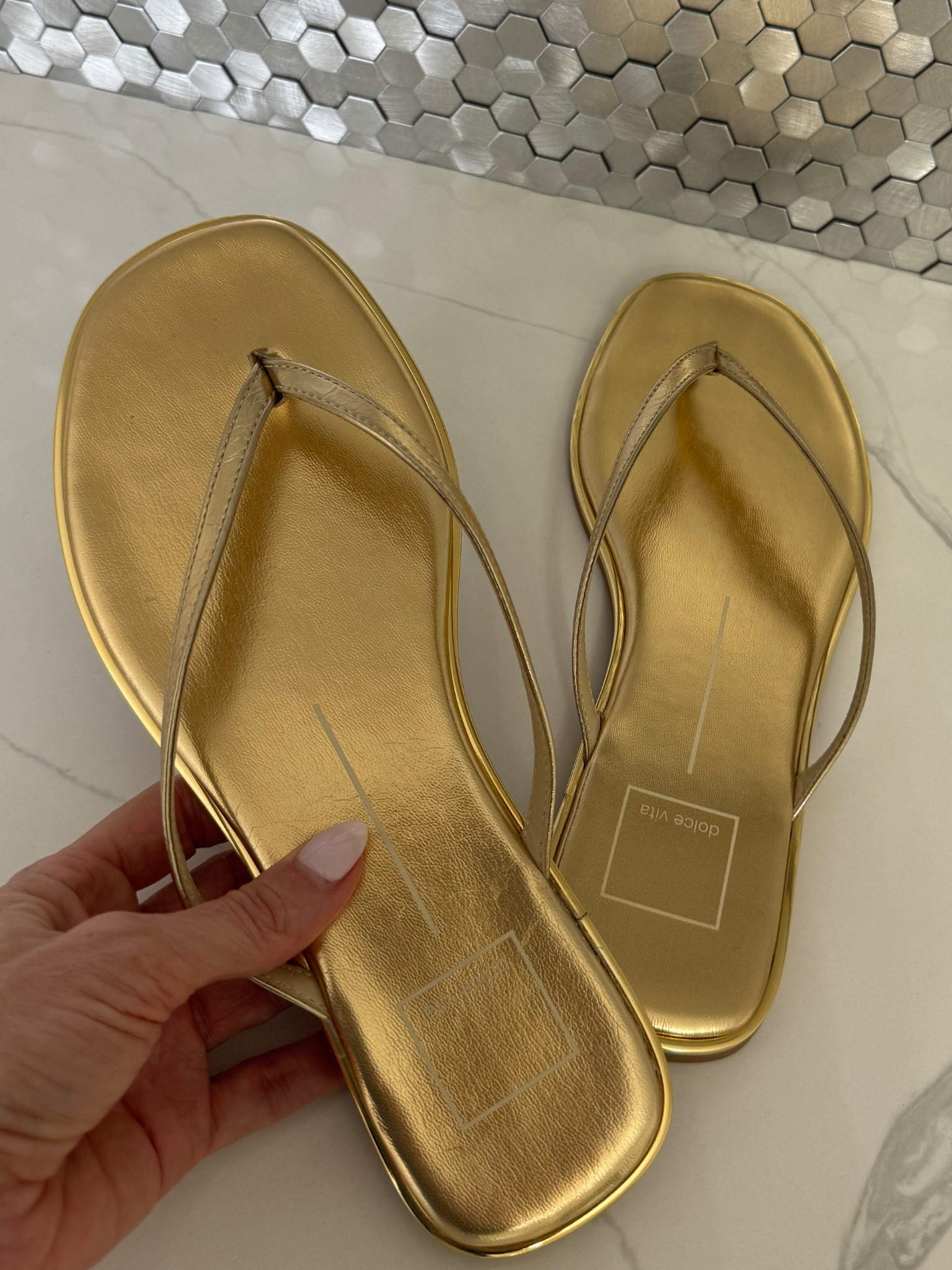 These gold metallic flip-flops from Dolce Vita are the definition of a chic spring and summer staple ✨ And the best part? They’re under $50 — such a steal!

I love the gorgeous metallic gold shade because it literally goes with everything in your wardrobe. From denim and dresses to casual everyday looks, these sandals instantly elevate any outfit while still being incredibly comfortable.

They also come in several colors, but this gold pair is my personal favorite because it’s so versatile and polished. If you’re looking for an easy, stylish sandal you’ll reach for all season long, these are it! 
SALE ALERT - 25% OFF SELECT STYLES! 

#ad #myDSW @DSW 



#LTKSaleAlert #LTKOver40 #LTKSeasonal
