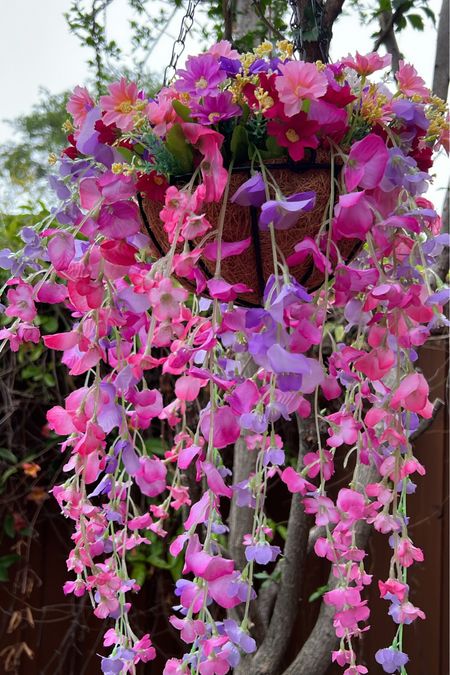 faux beautiful 🩷

these hanging baskets with cascading flowers are an easy & beautiful addition to any backyard!! 

#flowers #yardwork #backyard #gardening #outdoors

#LTKhome #LTKunder50 #LTKSeasonal