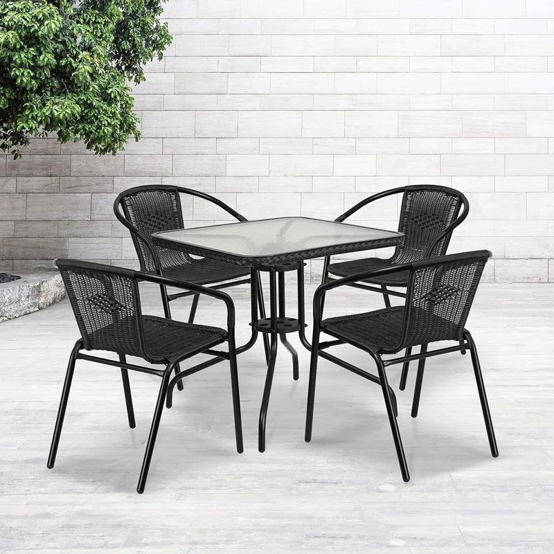 Amlie 28'' Square Glass Metal Table with Rattan Edging and 4 Rattan Stack Chairs | Wayfair North America