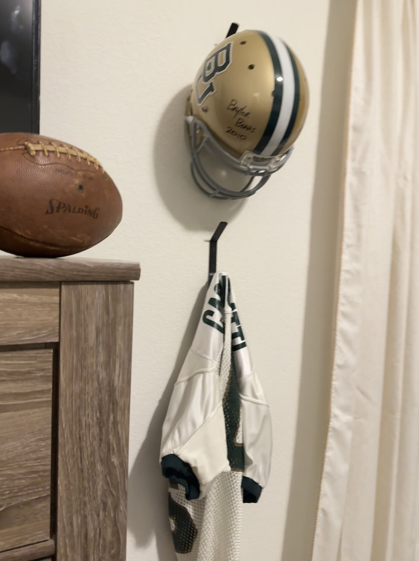 Affordable black metal hooks come with screw and anchors to hang clothing, hats, bags for display or storage. Green and yellow bedding  

#LTKHome #LTKKids