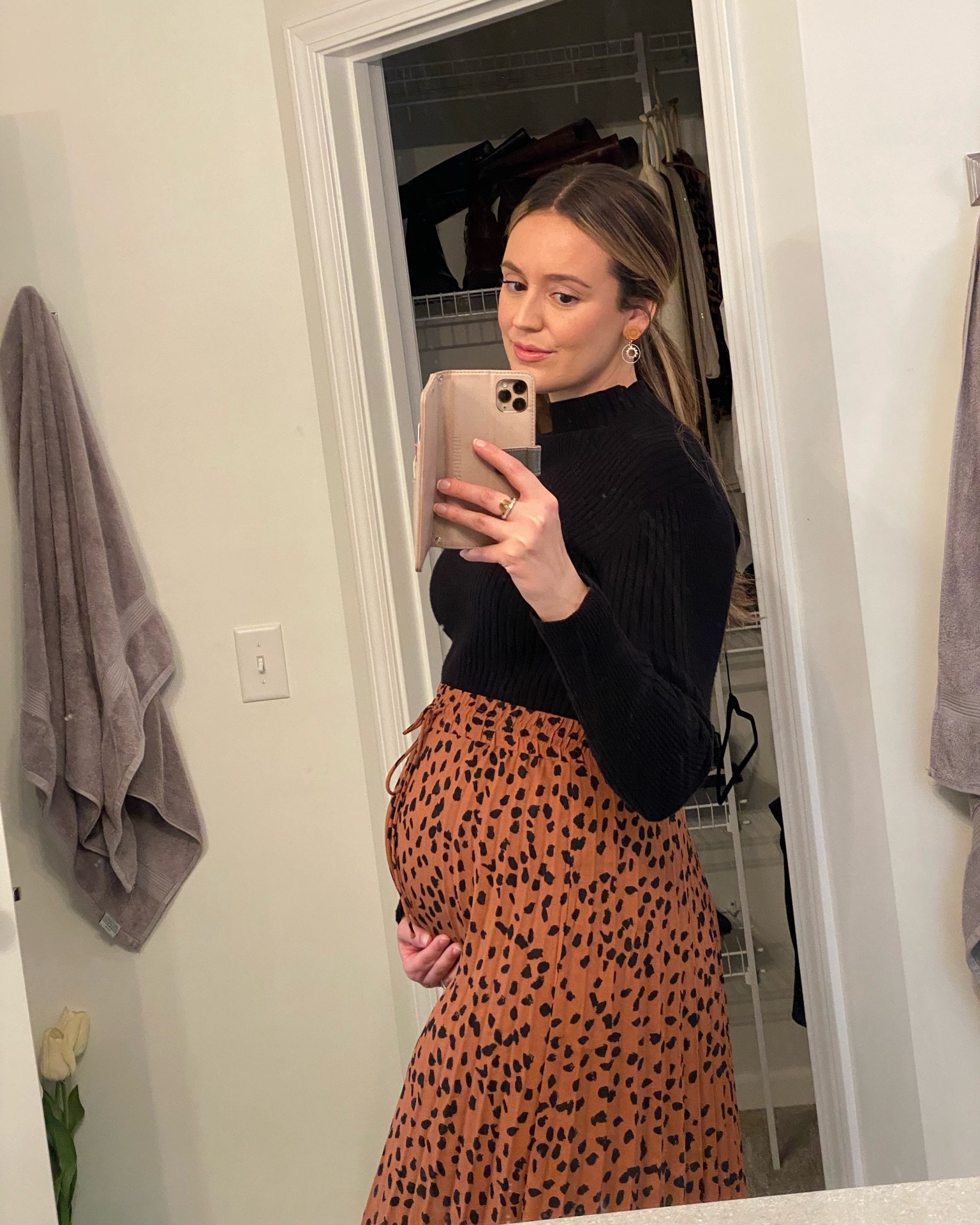 Loved wearing this Pink Blush Maternity skirt to work once I stopped being comfortable in work pants. This skirt paired with a long sleep black top is a perfect fall look.

#LTKbump #LTKunder100 #LTKstyletip