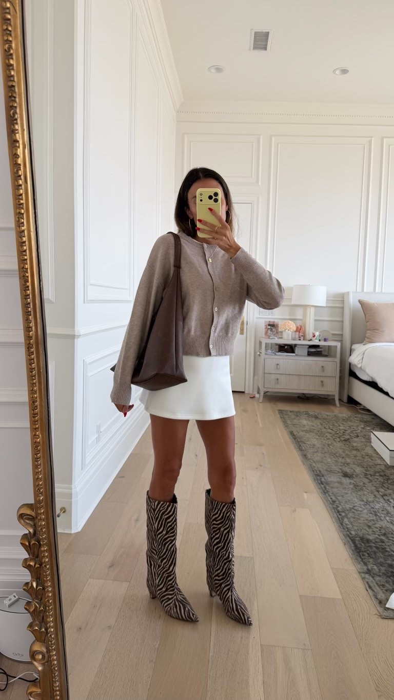 Transitional fall outfit 〰️

Cardigan, white skirt and bag from Amazon
@Steve Madden US zebra boots

#LTKootd #LTKOver40 #LTKSeasonal