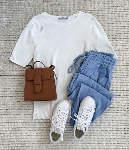Casual spring and summer outfit with blue joggers paired with white tee and sneakers. Love this top because it can be dressed up or down! These joggers come in a few colors that are so flattering on 

#LTKSeasonal #LTKstyletip