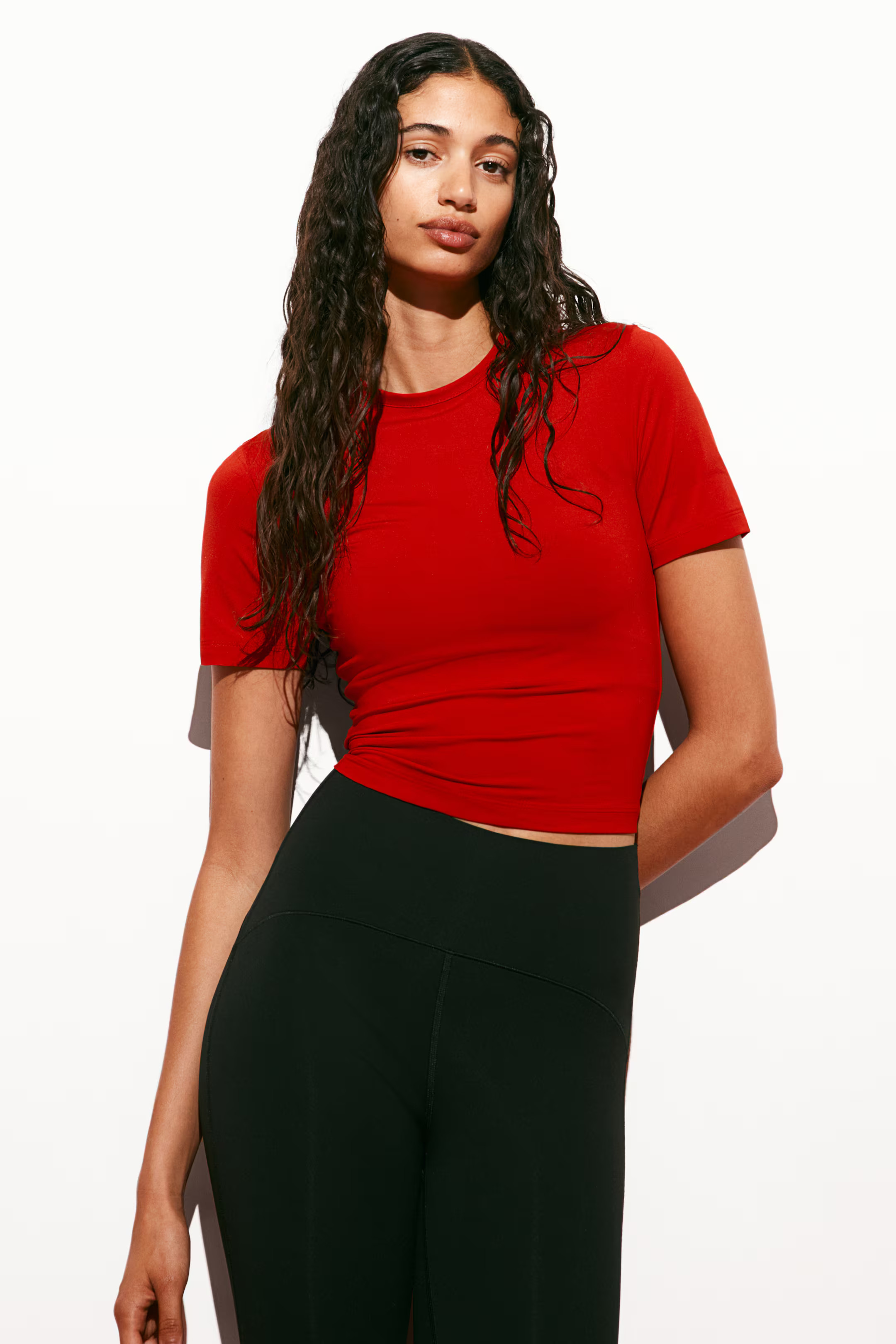 Cropped sporttop van DryMove™ | H&M (DE, AT, CH, NL, FI)