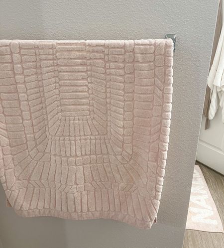 BATHROOM DECOR - Pink textured accent bath towels from Anthropologie 💗 matches my pink Get Naked bath mat from Urban Outfitters!

Bathroom organization, apartment bathroom, pink decor

#LTKhome #LTKFind #LTKSeasonal
