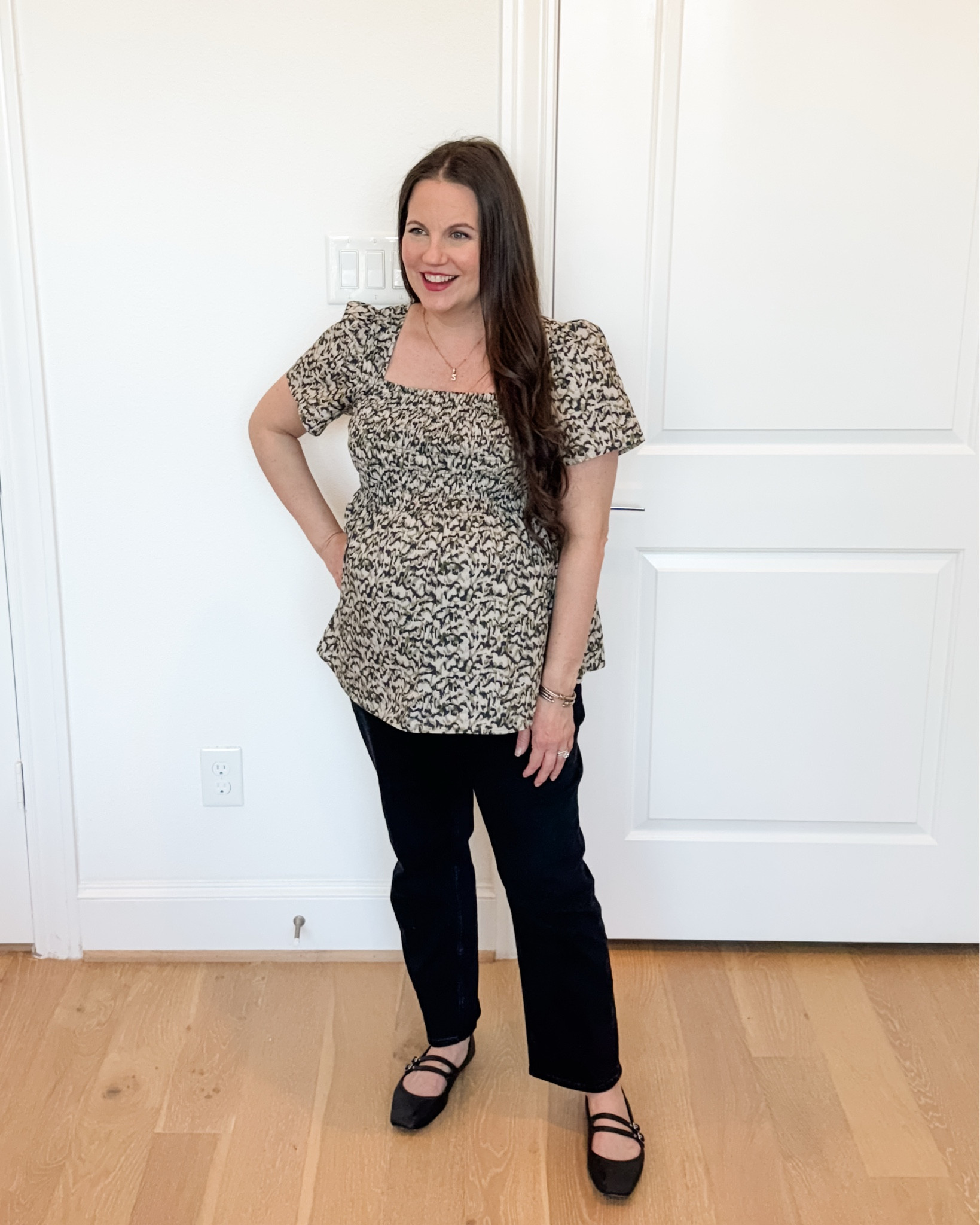 A simple and polished spring outfit featuring a comfortable maternity outfit that works for both casual days and workwear. This maternity smocked short sleeve top doubles as a flattering workwear babydoll top and pairs perfectly with straight leg black jeans, my pick for the best maternity jeans.

Styled with black Mary Jane flats, this look is ideal for effortless dressy casual style and everyday pregnancy style.


#LTKSeasonal #LTKOver40 #LTKBump