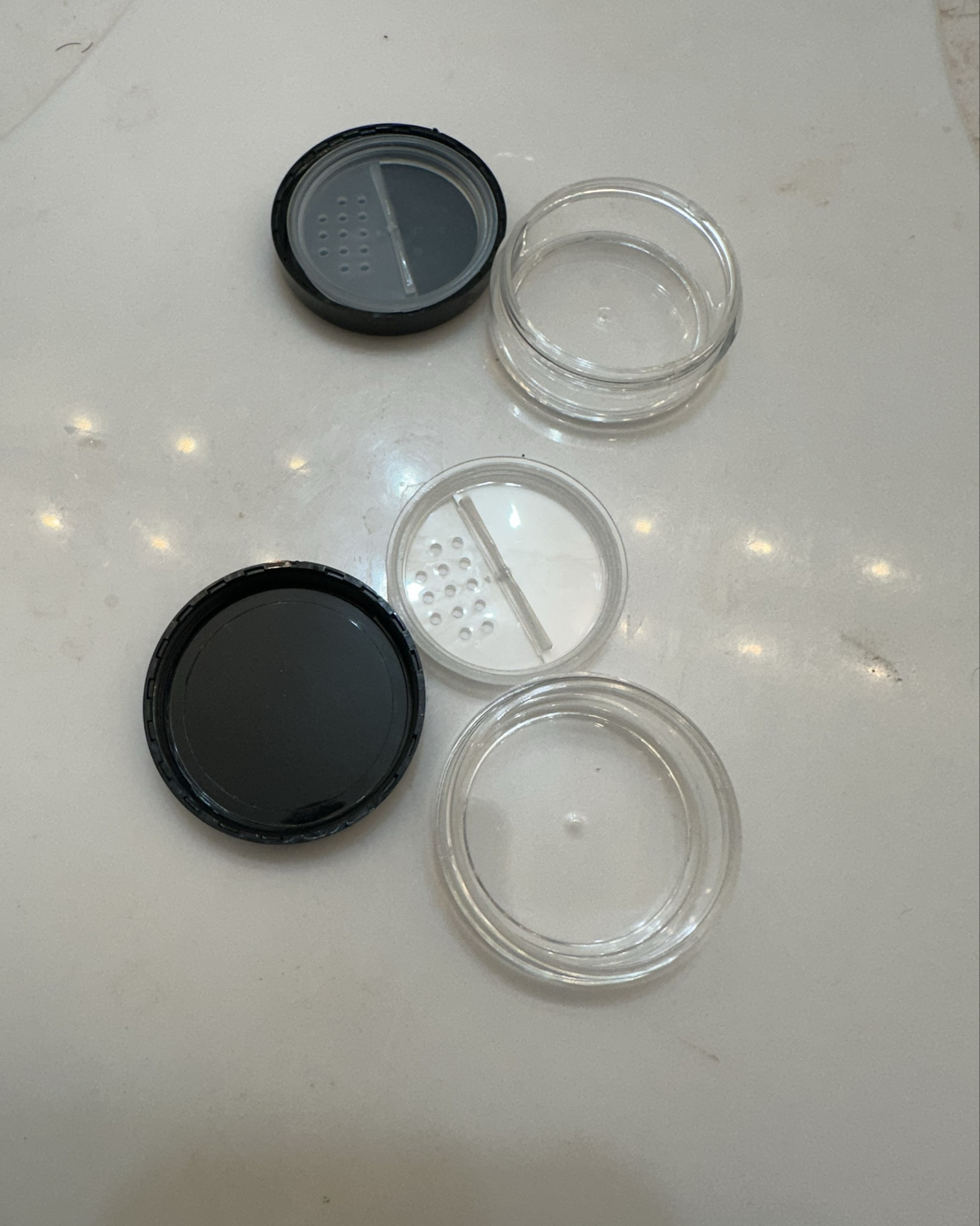 Great small travel makeup powder container that easily holds a lot of powder and is small to keep in a makeup bag 

#LTKBeauty #LTKU #LTKStyleTip