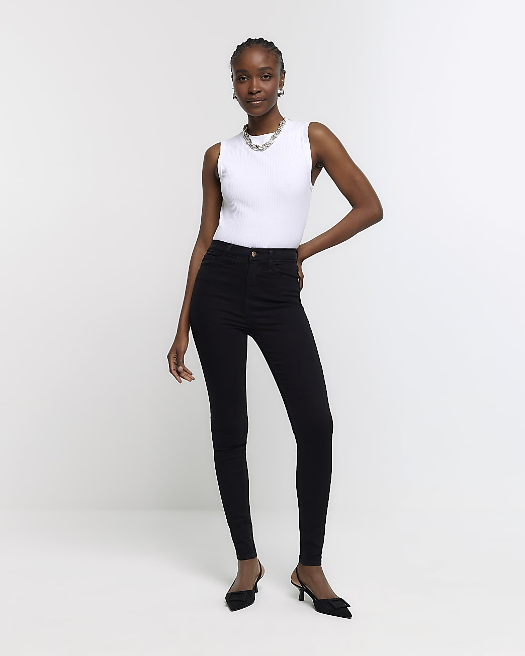 Black high waisted skinny jeans | River Island (UK & IE)