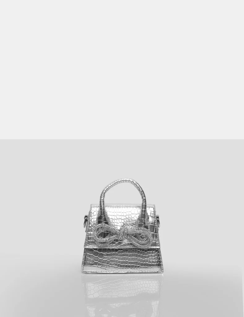 The Indy Silver Croc Pu Diamante Bow Mini Bag | Public Desire (US & CA)