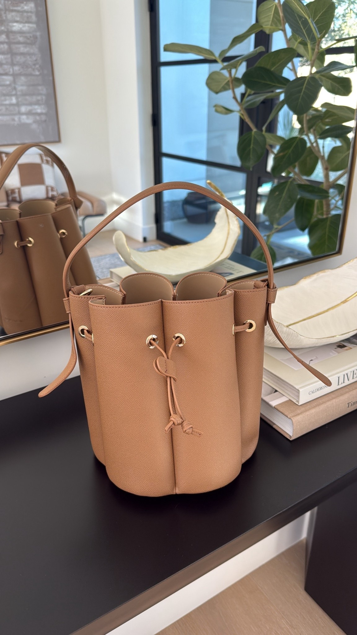 This bucket bag is my fav recent find! Under $100 and SO pretty! The color is perfect for now & into spring & summer 👏🏽 comes with a removable long strap to wear crossbody too 

#LTKSeasonal