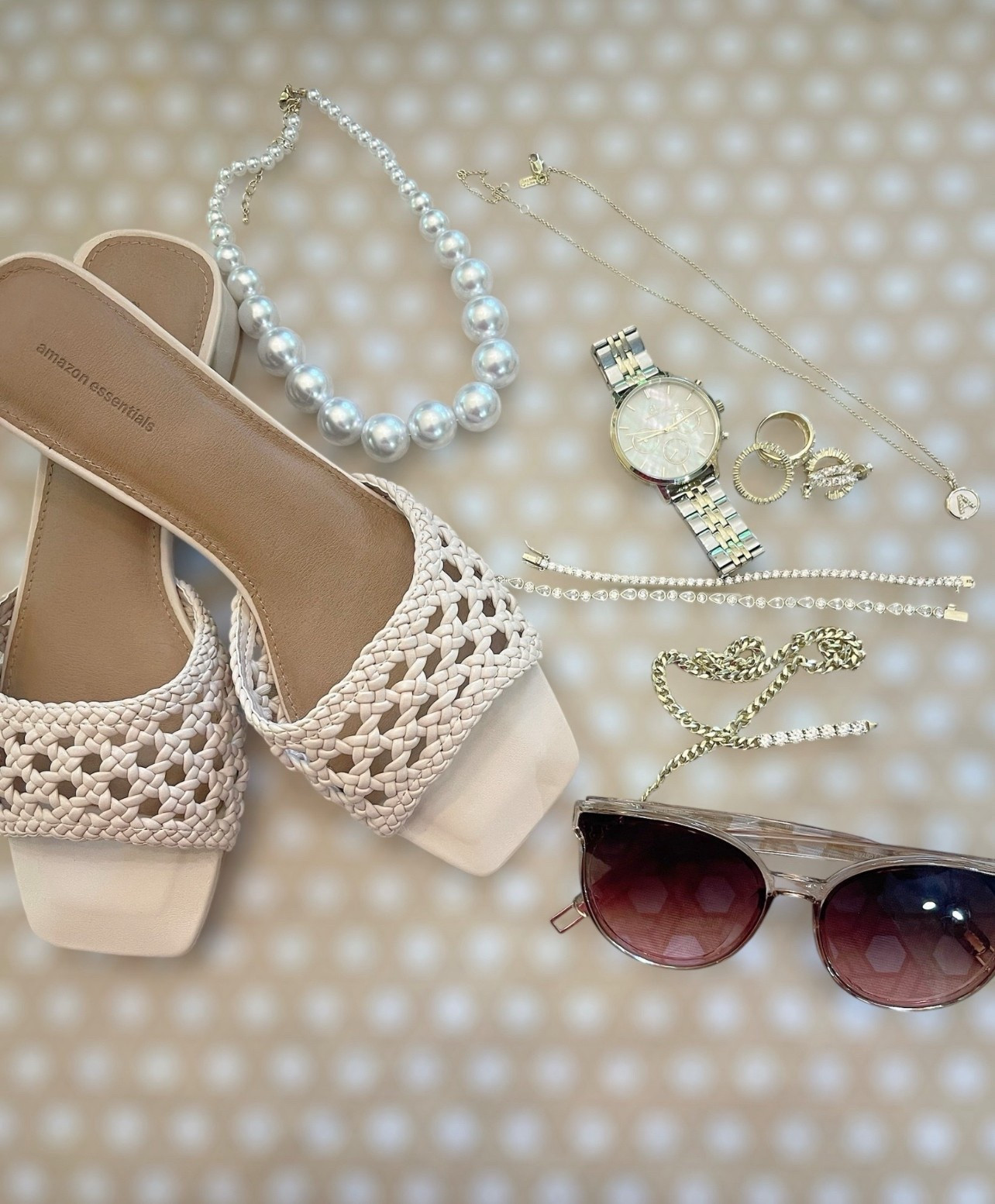 ✨ Use code PREPPYREBEL for 10% off all Melinda Maria jewelry! ✨

Spring neutrals I’m loving! These $28 Amazon Essentials woven sandals (wearing size 7.5, color Cream Cane Weave) are an effortless match for pearl accents, dainty gold jewelry, and classic sunnies!
I styled them with my Melinda Maria pieces — including diamond tennis bracelets, stacking rings, and a gold heart charm necklace (use my code for a discount!).
Also featuring a classic pearl statement necklace and a chic mother-of-pearl watch for a polished, feminine vibe.
These Amazon slides are comfy, under $30, and come in multiple colors — a must for your spring-to-summer wardrobe!

Amazon woven sandals, affordable spring accessories, neutral outfit flatlay, Melinda Maria discount code, spring jewelry stack, under $30 sandals, pearl jewelry, Amazon spring finds, LTK spring outfit inspo


#LTKSummerEdit #LTKFindsUnder50 #LTKShoeCrush