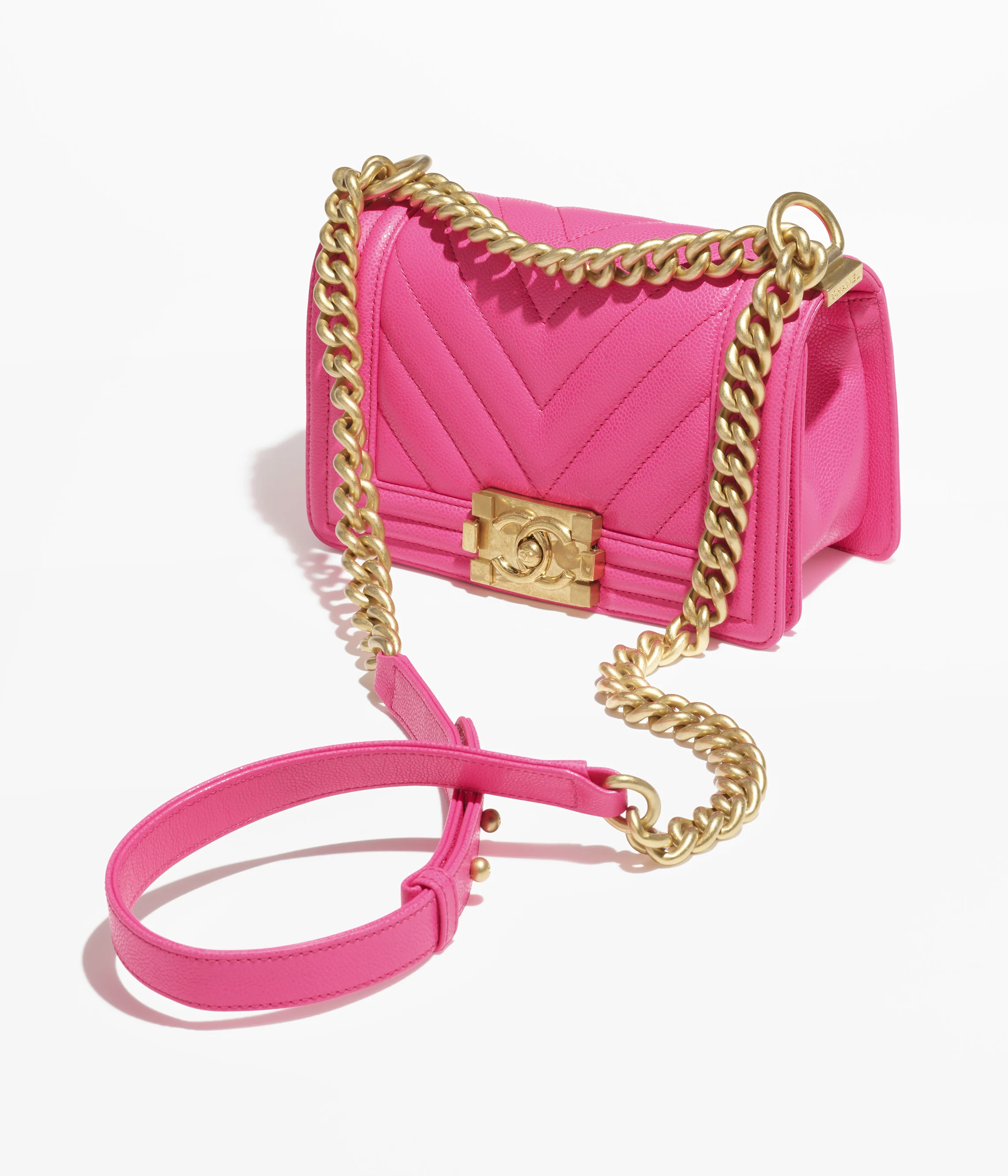 Small BOY CHANEL Handbag

            
		Grained Shiny Calfskin & Gold-Tone Metal
	
		Fuchsia | Chanel, Inc. (US)