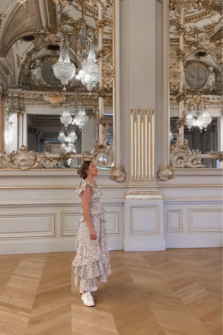 Feminine ruffled midi dress in Paris. Loved the neutral floral print and the open back. Easily one of my favorite travel outfits from the trip. 

Floral dress. Midi dress. Ruffled dress. Casual dress. Paris style. Paris fashion. Summer outfit. Claw clip. 

#LTKFind #LTKtravel #LTKeurope