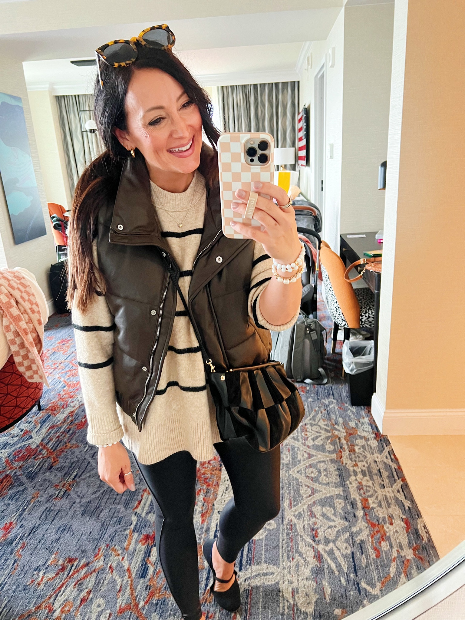 • medium Abercrombie vest - could have done a small 
• true size small sweater - runs oversized 
• medium petite Spanx - code ASHXSPANX for 10% off 
• sized up a size in shoes
• code ONTHEGO23 for 20% off purse 

#LTKstyletip #LTKSale #LTKfindsunder50