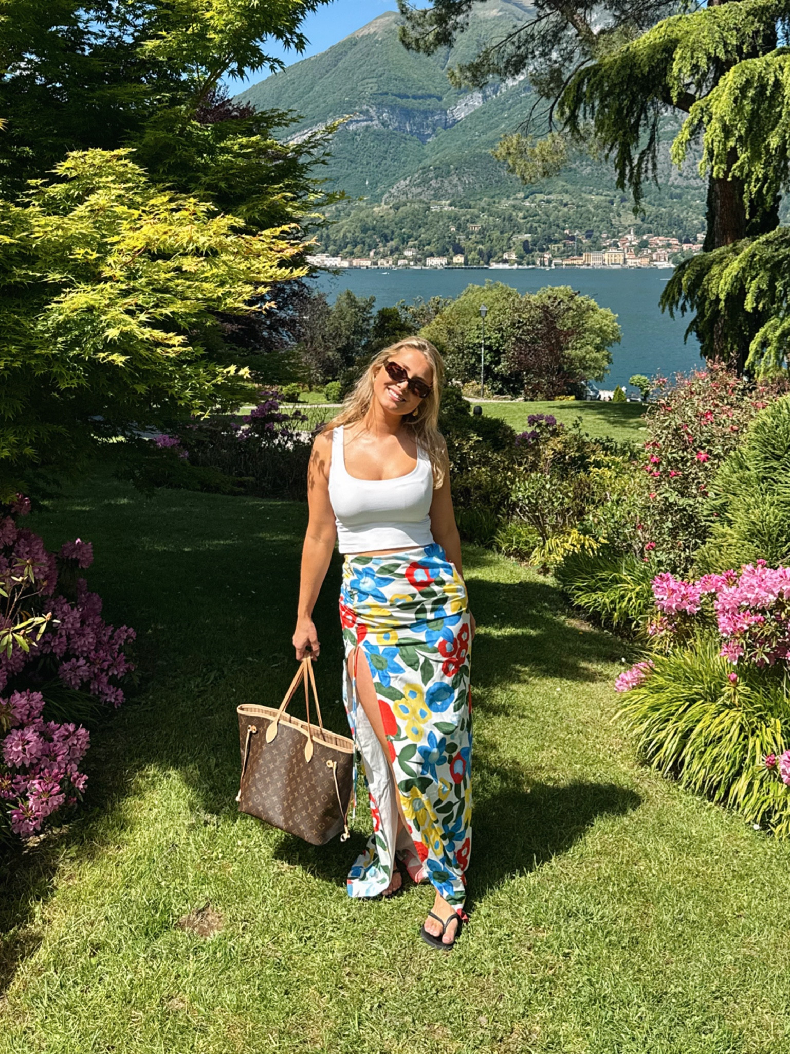 Summer outfit, holiday outfit, floral maxi skirt, white vest top, Louis Vuitton never full bag, black havaiana flip flops 

#LTKuk #LTKsummer #LTKstyletip