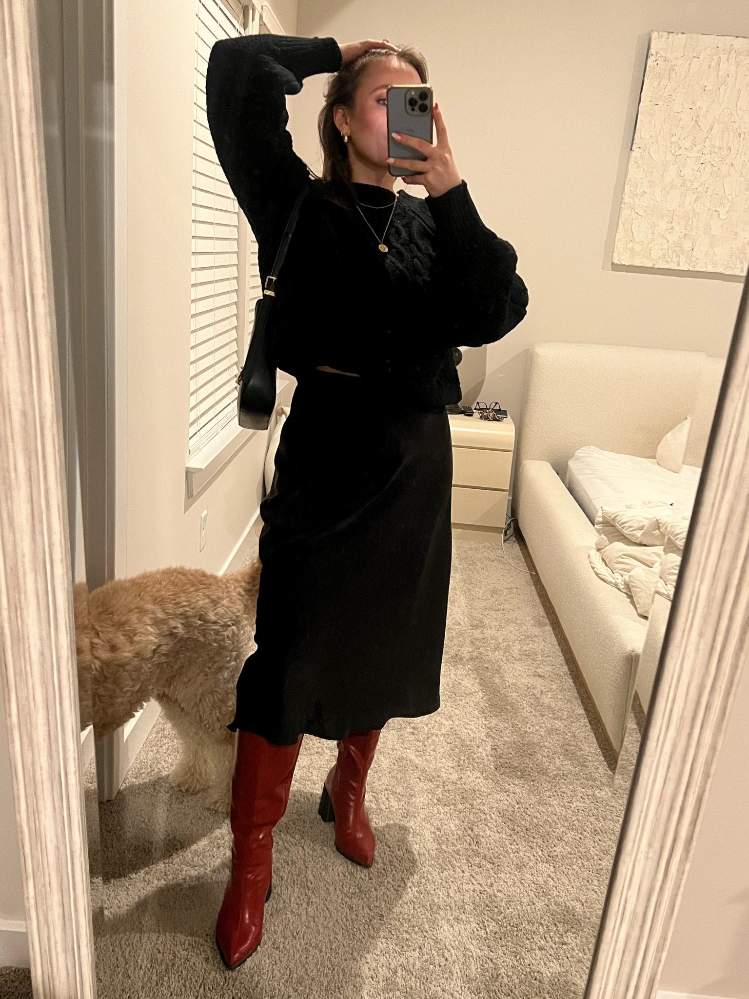 Long black skirt with a cable knit sweater and knee high red boots for a date night look 

#LTKfit