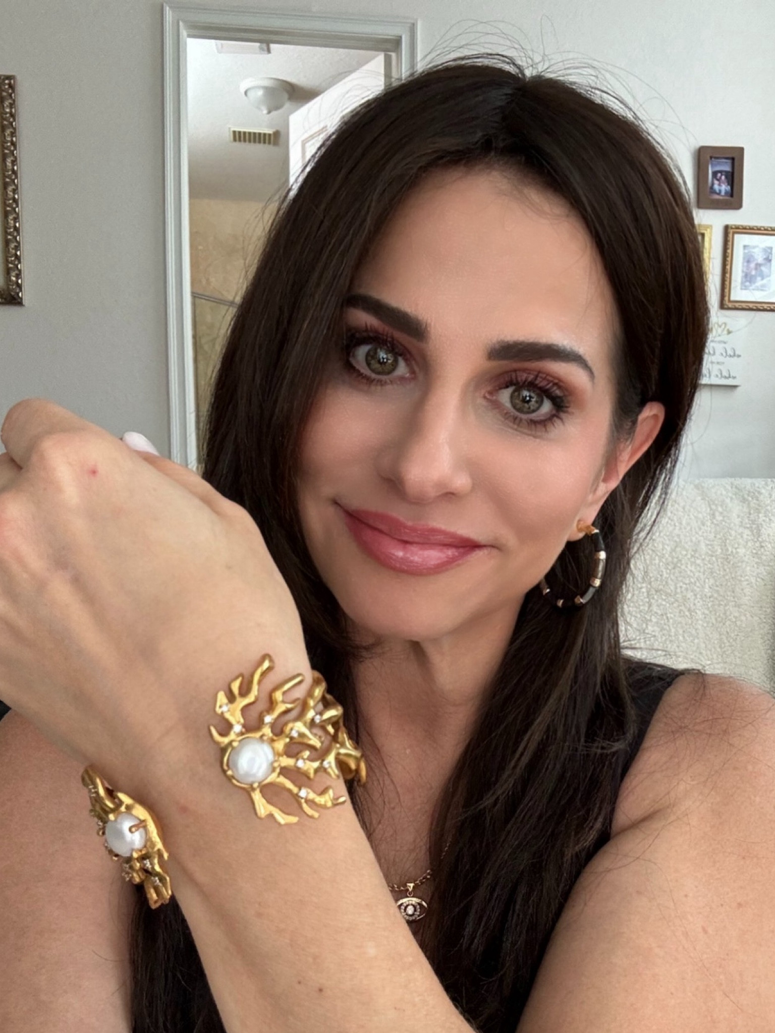 New statement bangle with pearl and black hoop earring made with black Mother of Pearl . 

#LTKStyleTip #LTKOver40