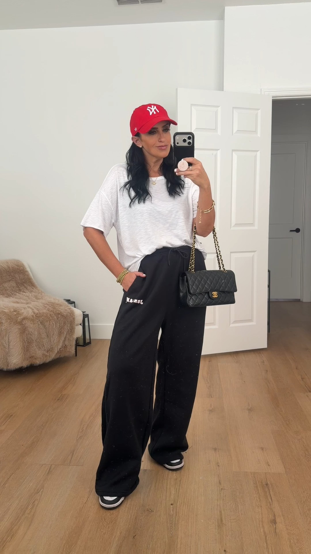 Jordan Brooklyn Fleece wearing size medium. White tshirt. 