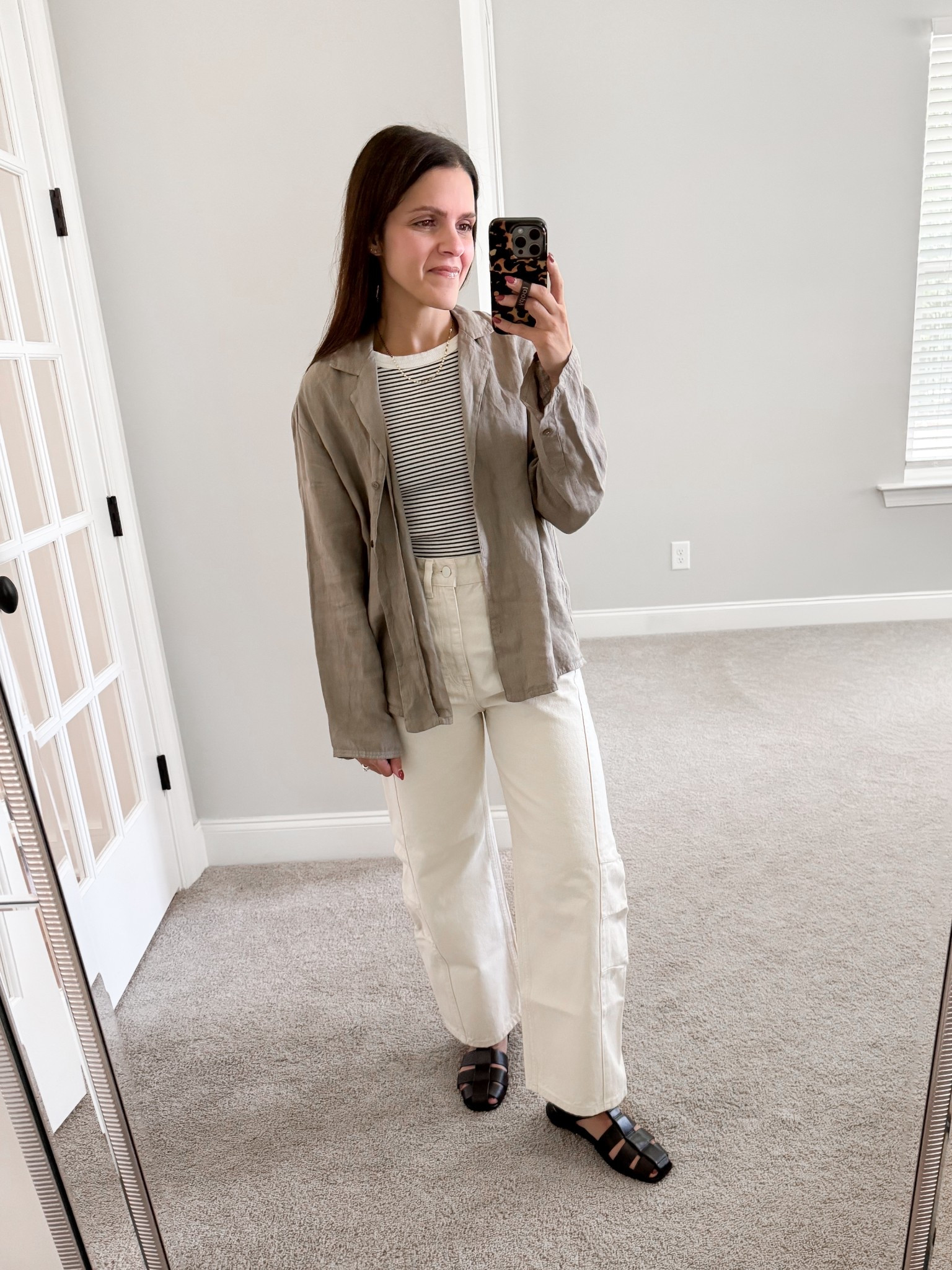 What I wore: 
Striped tank: Madewell, XS
Linen button up: Zara, XS
Barrel ecru Jean: old, linked similar
Fisherman sandals: Everlane, tts 

#LTKStyleTip