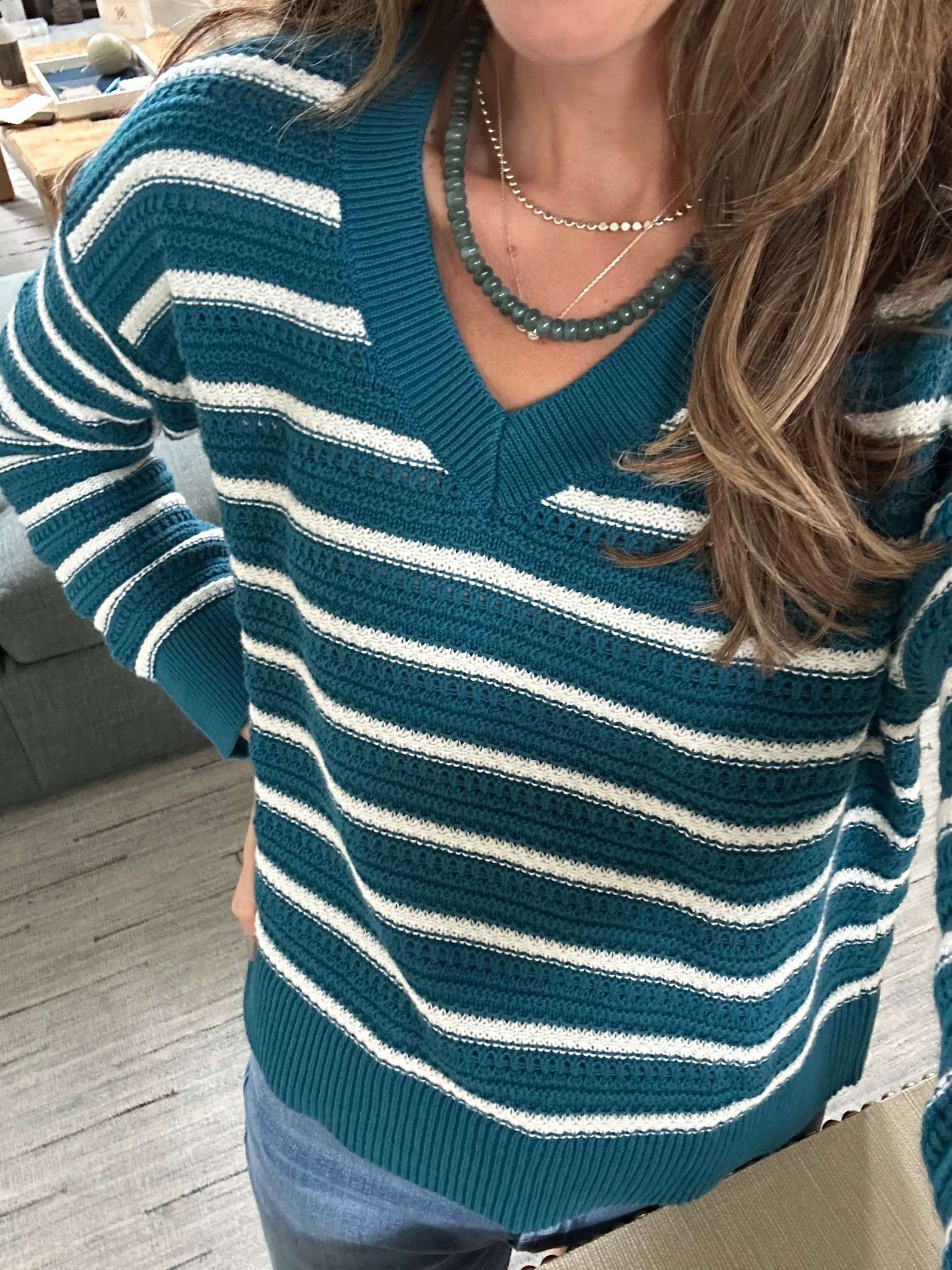 Sea Green striped sweater for fall from loft 
On sale 
100% cotton - size up for looser fit 

#LTKFallSale #LTKStyleTip
