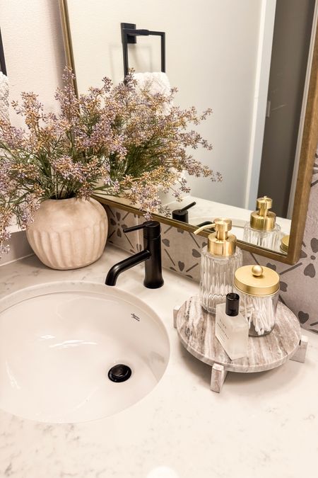 A little bathroom refresh! Do you notice what is new?

Home  Home decor  Home favorites  Favorite finds  Bathroom decor  Bathroom accessories  Faux florals  Vase  Marble  Canisters

#LTKhome #LTKSeasonal