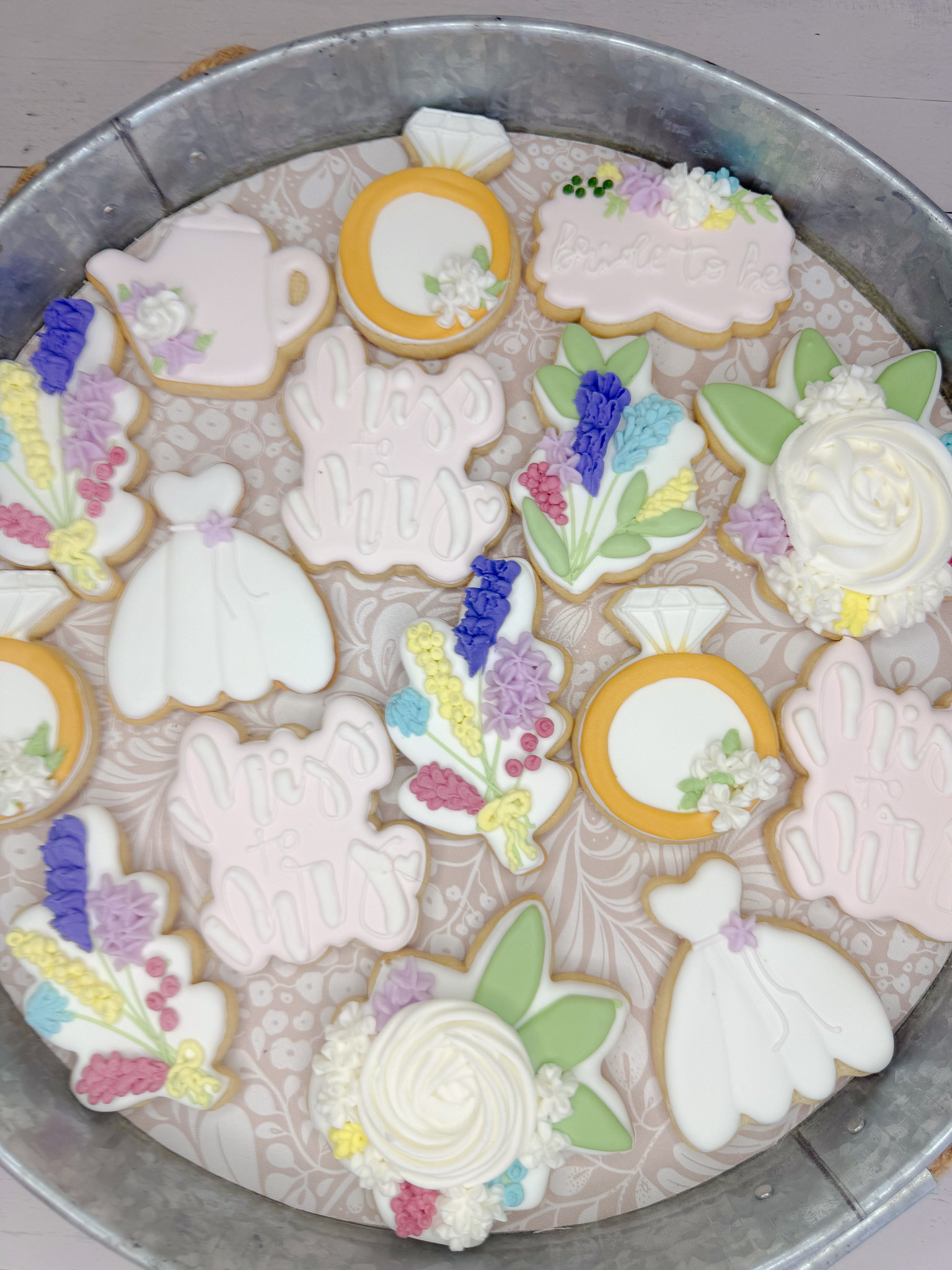 This bridal shower cookie set is soft, feminine, and full of the sweetest little details. 💍 From “Miss to Mrs” and “Bride to Be” designs to engagement rings, wedding dresses, florals, bouquets, and white rose details, these cookies are perfect for a bridal shower dessert table, engagement party, or custom party favors for the bride-to-be.

#LTKWedding #LTKFamily #BridalShower #BridalShowerCookies #MissToMrs #BrideToBe #WeddingCookies #CustomCookies #DecoratedCookies #SugarCookies #CookieDecorating #BridalShowerIdeas #DessertTable #WeddingDesserts #PartyInspo 

 #LTKdayinmylife #LTKfoodie #LTKWedding