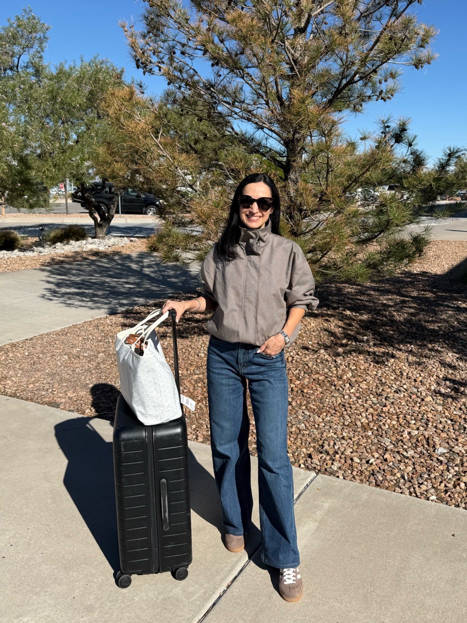 Travel day fit🤎 wide leg jeans comfy enough for the plane and my favorite new plaid jacket!! Target sunnies

#LTKOver40 #LTKPetite #LTKTravel