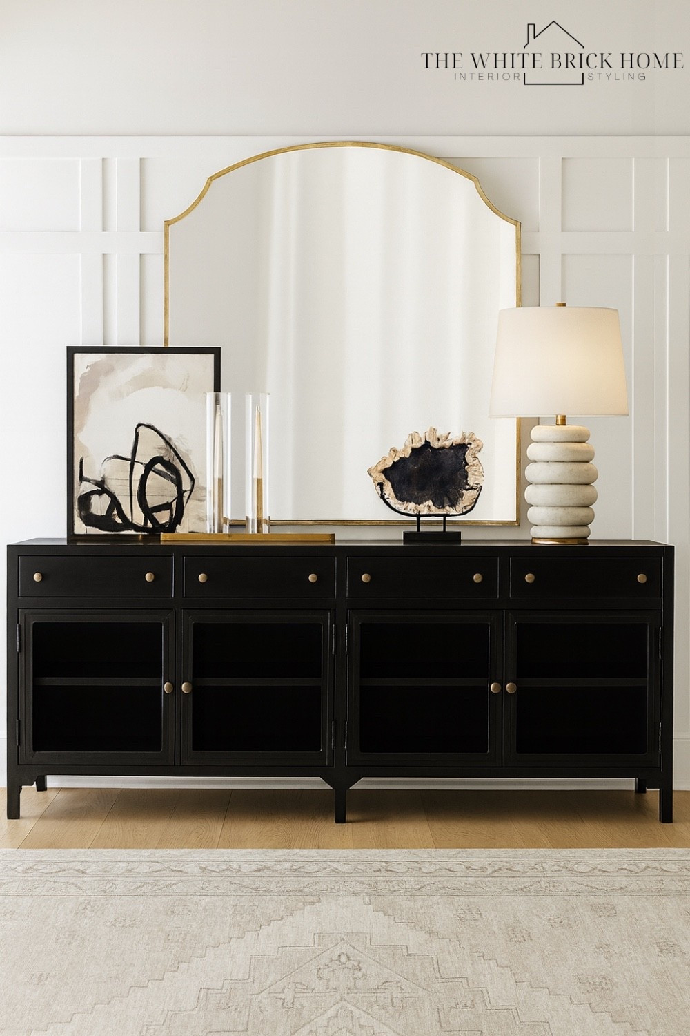 I love the mix of modern and traditional in this buffet table styling. This would be beautiful in either a dining room or entryway. 
🖤🖤
Buffet table, console table, wall mirror, table lamp, wall art, candle sticks, candle holders, area rug, dining room furniture, dining room buffet table, cabinet, storage cabinet, table lamp, lamp, home decor, home design, table design, foyer table, McGee and co, crate and barrel, pottery barn 


#LTKHome #LTKSeasonal #LTKSaleAlert