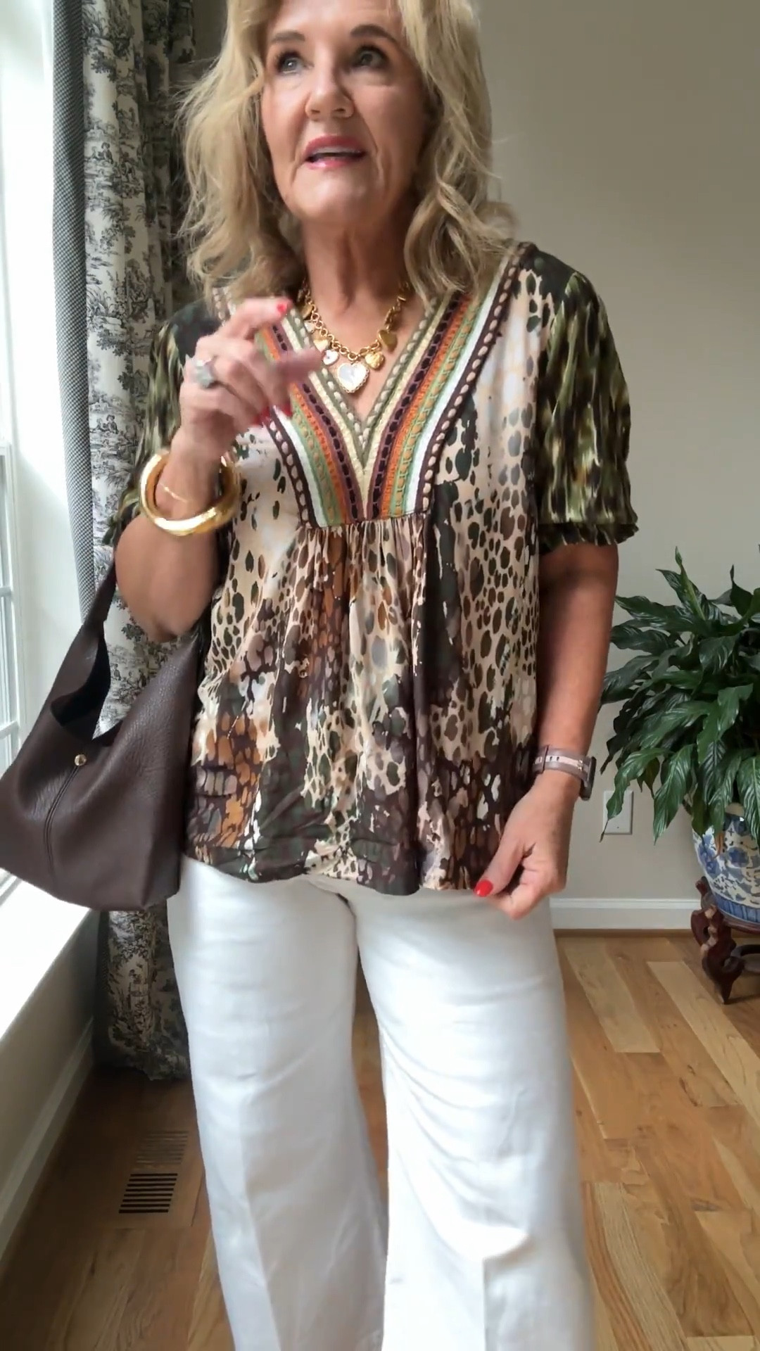 OOTD 
Anthro top size medium love the nod to animal print 
Colette jeans 29 petite 
Wooden block heel sandal 
Julie Vos charm necklace linking some others too 

#LTKOver40 #LTKautumn #LTKPetite