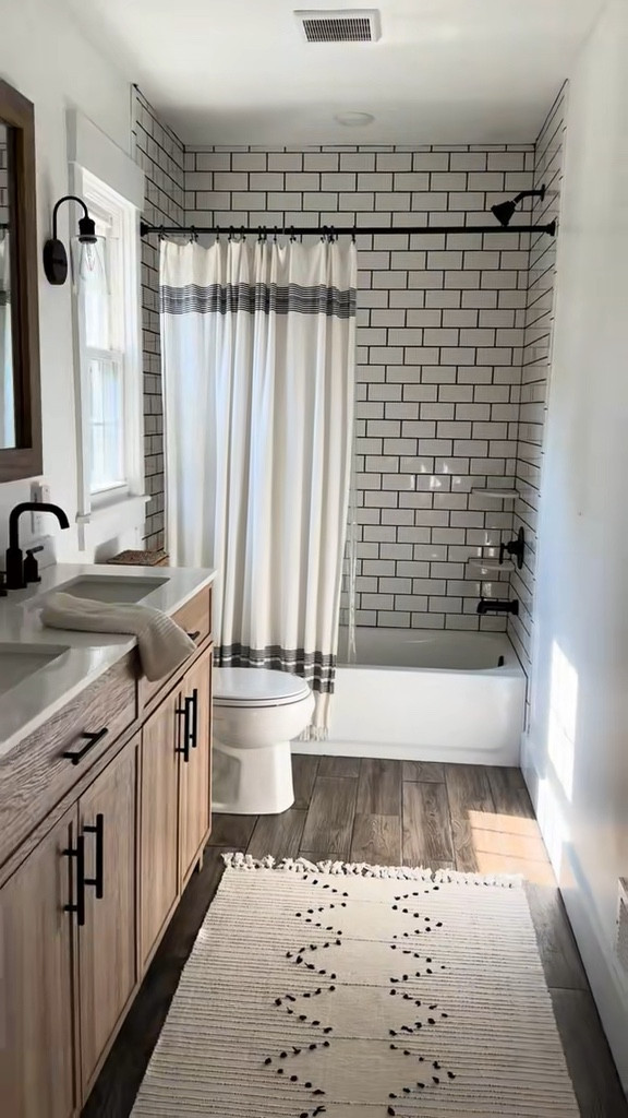 The boys’ bathroom! Love the serene neutral tones in here and we LOVE this flooring! 

#LTKWatchNow #LTKFamily #LTKHome