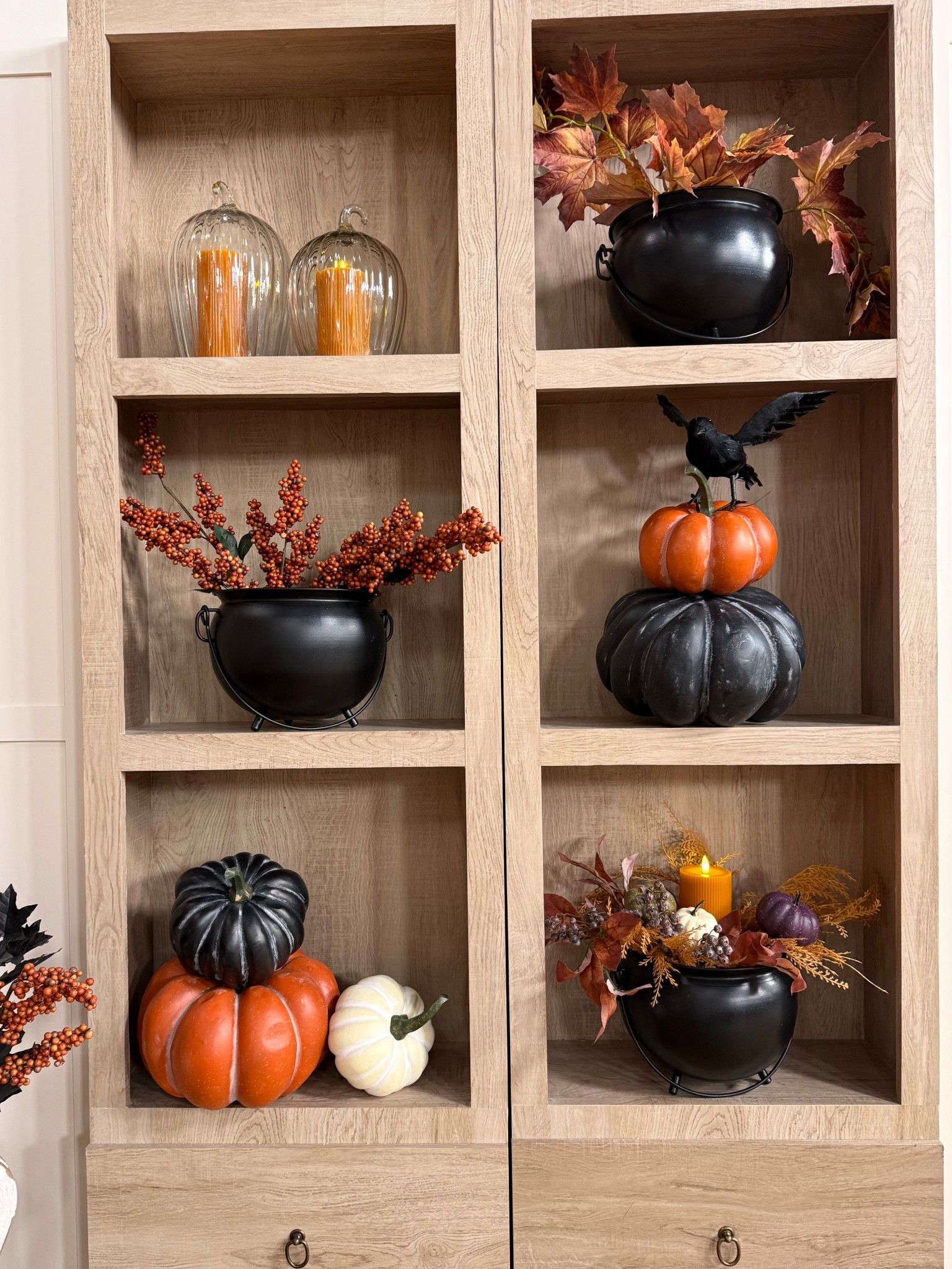 Halloween, but make it chic 🖤🍂 Styled shelves with just the right mix of drama + warmth.

#LTKHome #LTKSeasonal #LTKStyleTip