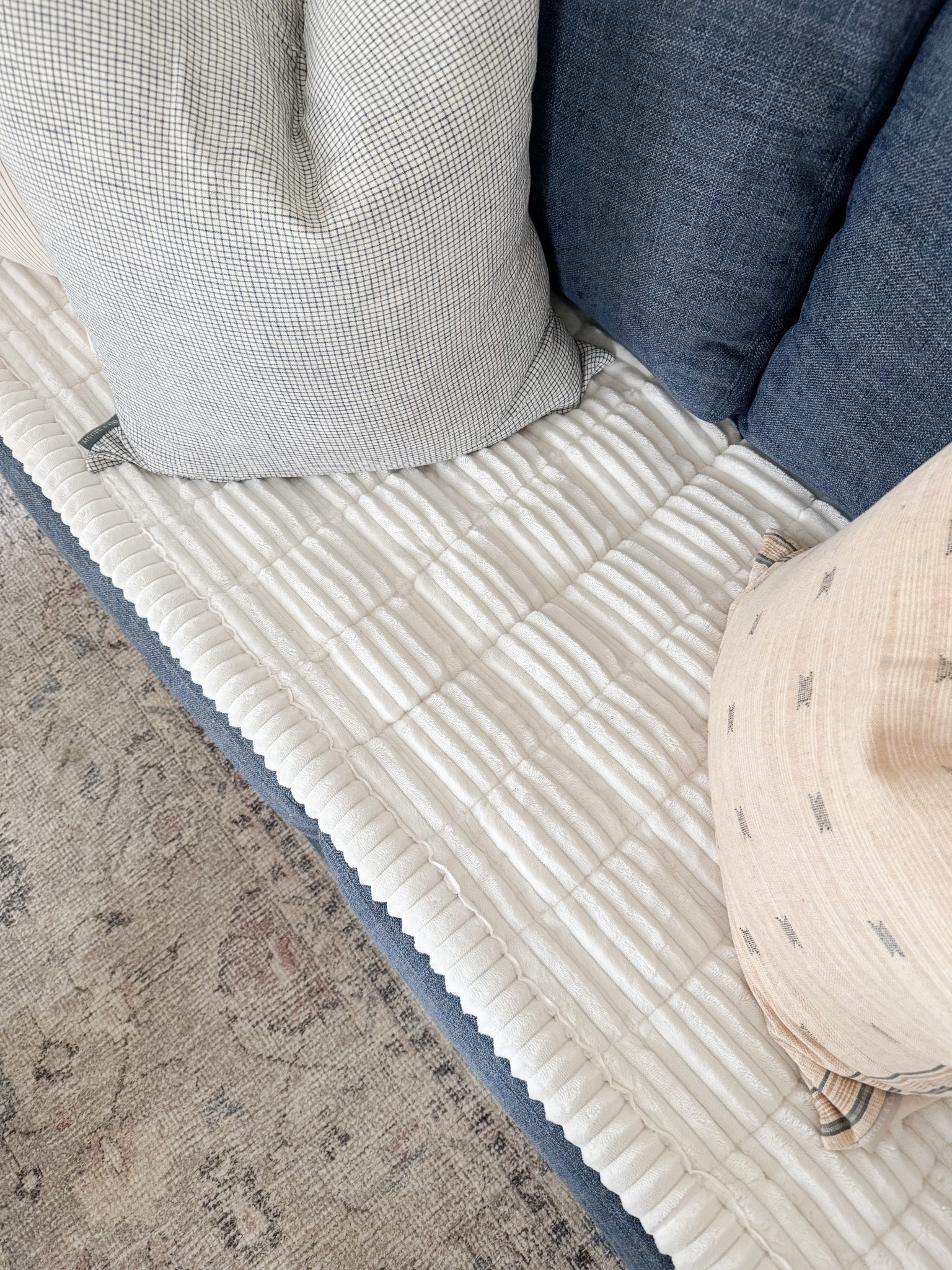 Coastal living room styled with neutral throw pillows, textured ivory rug, faux florals, and layered sofas for a relaxed high end coastal look.

coastal living room decor,  neutral sofa styling, coffee table florals, light coastal interiors, sherricalnanhome

#LTKHome
