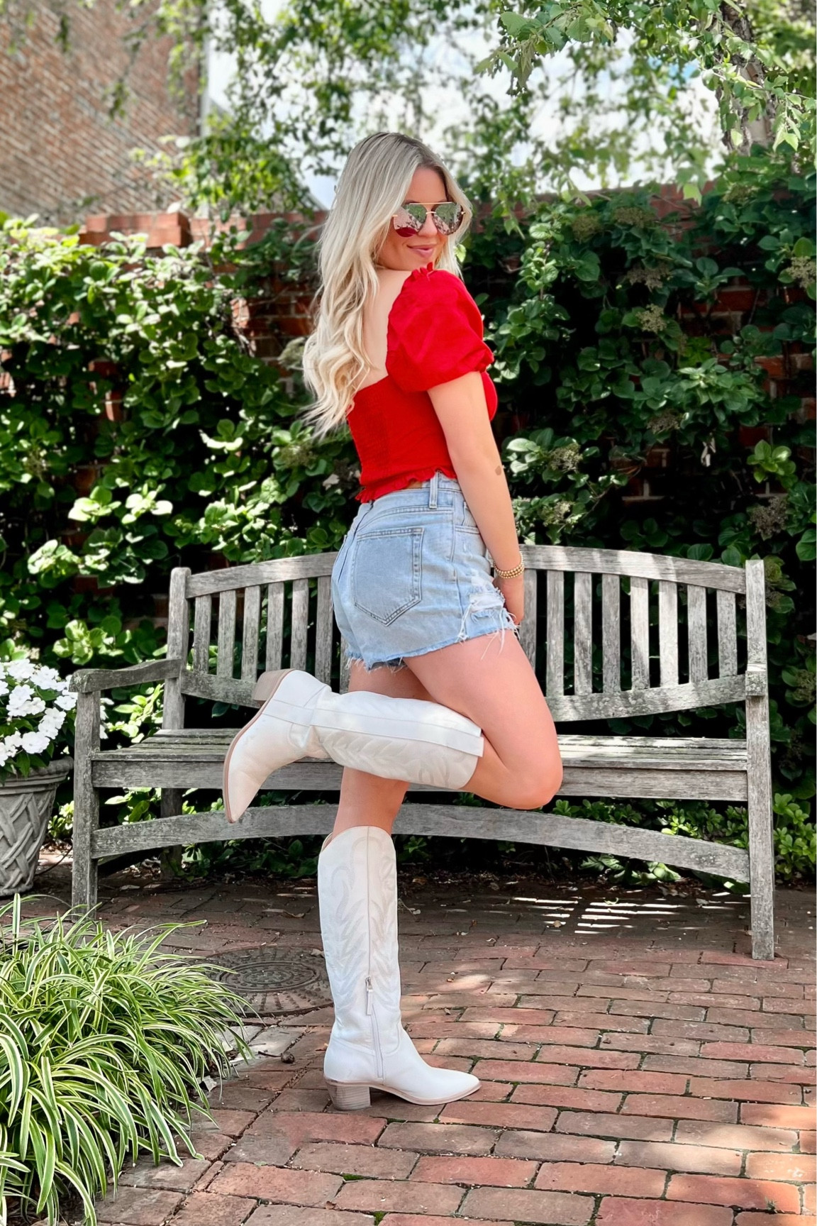 Red top, denim shorts, white cowboy boots, July 4th outfit 

#LTKSeasonal #LTKunder100 #LTKstyletip