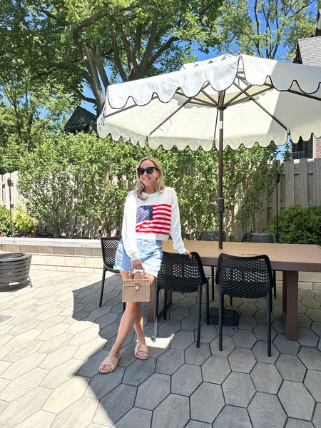 Fourth of July Outfit
American flag sweater | Agolde Parker long Jean shorts | summer sandals | vacation | patio 