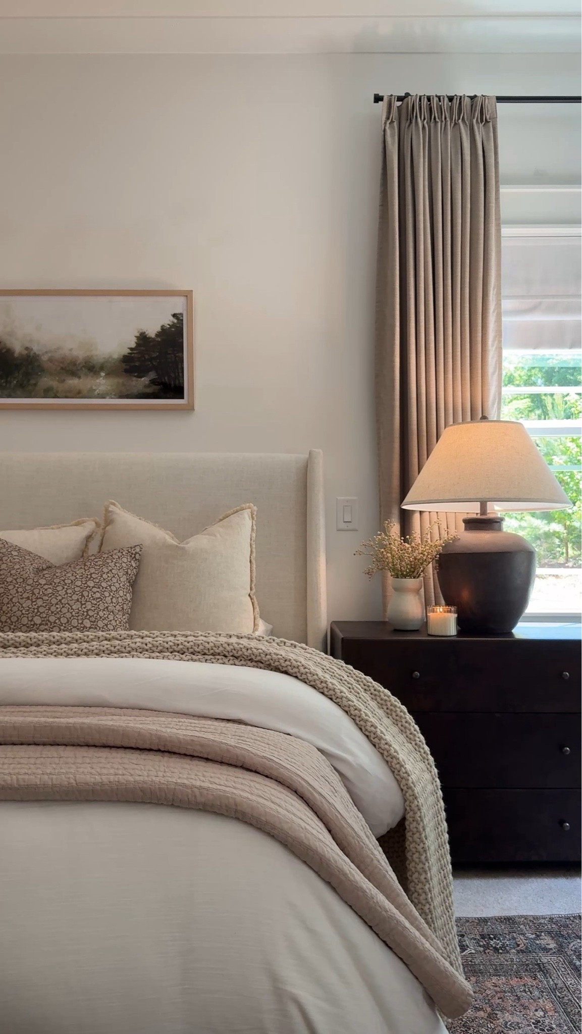 This angle of our primary bedroom will always be a favorite. I love the landscape art, our moody nightstand, and our upholstered bed. Plus, the neutral bedding is so cozy! It will forever be a favorite space in our home. 🤍🙌🏻

#LTKHome