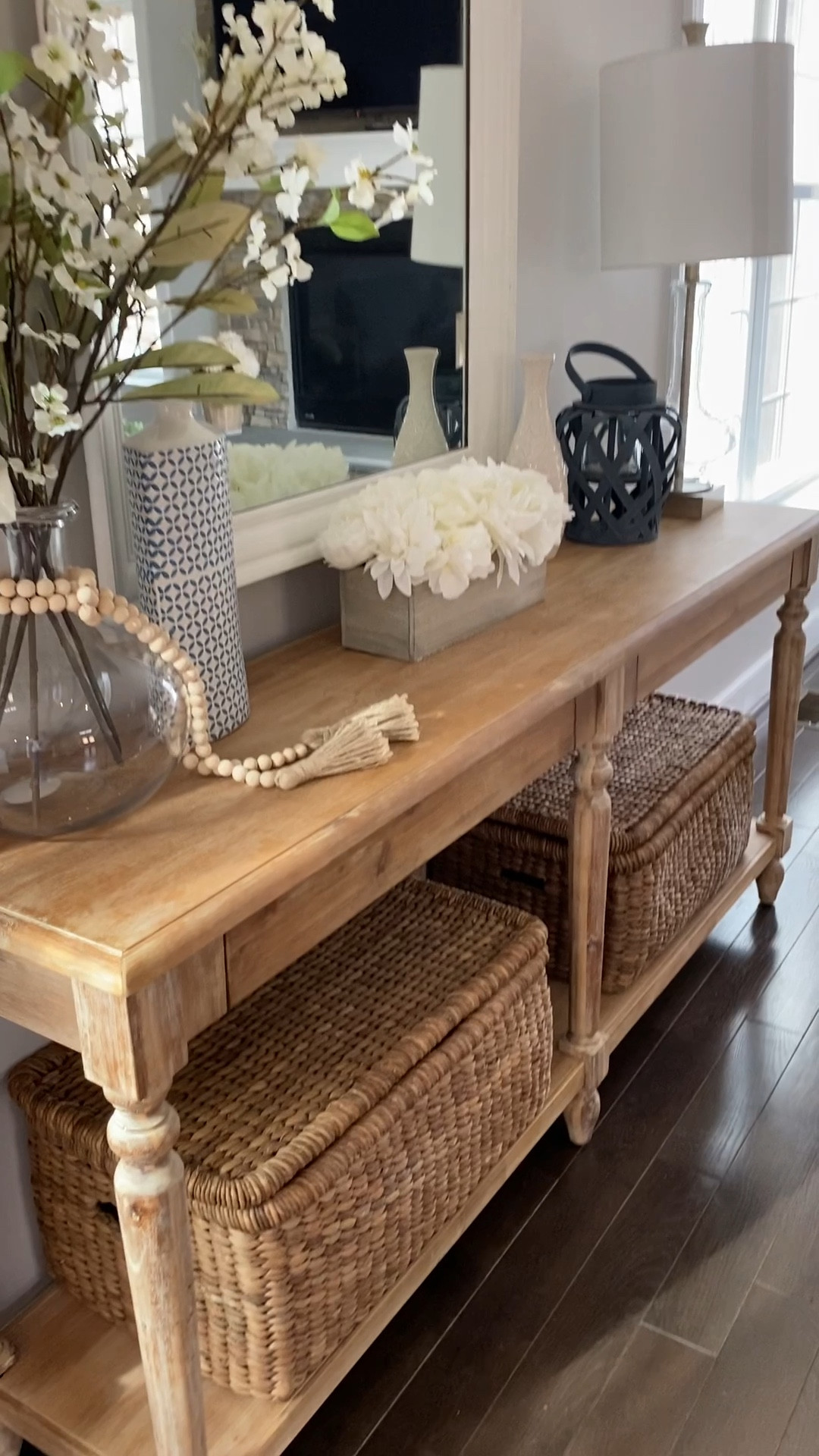 Clear the toy clutter with this toy organization solution! The link for these baskets has been strange so click through and then search beachcomber basket. I also can’t say enough about this fabulous coastal style console table 

Toy organizer, toy organizing, kids organization, family room organization, family room organizer, basket with lid, large basket with lid, lidded basket, console table with drawers 