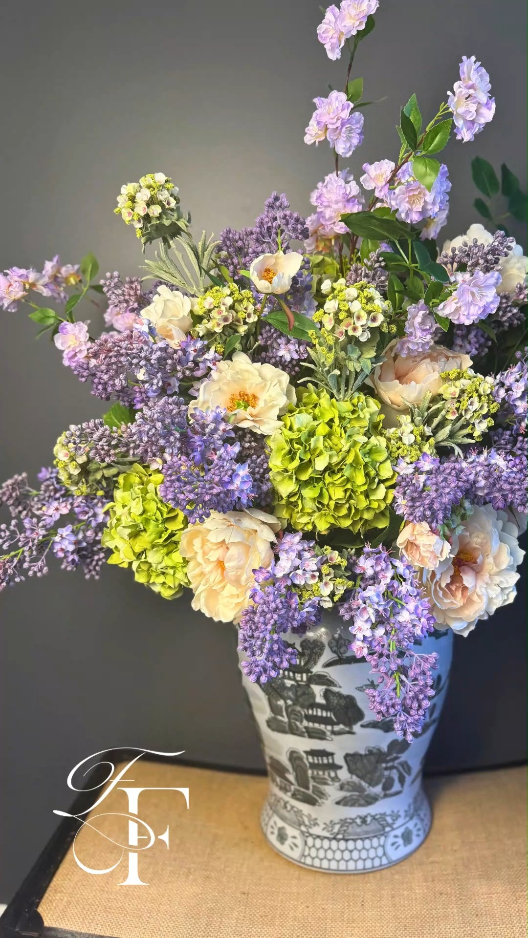 Spring decor faux floral arrangement. I love the faux lilacs and hydrangea mixed with these beautiful soft pinks. 🩷🪻 

 #LTKdayinmylife #LTKSeasonal #LTKHome