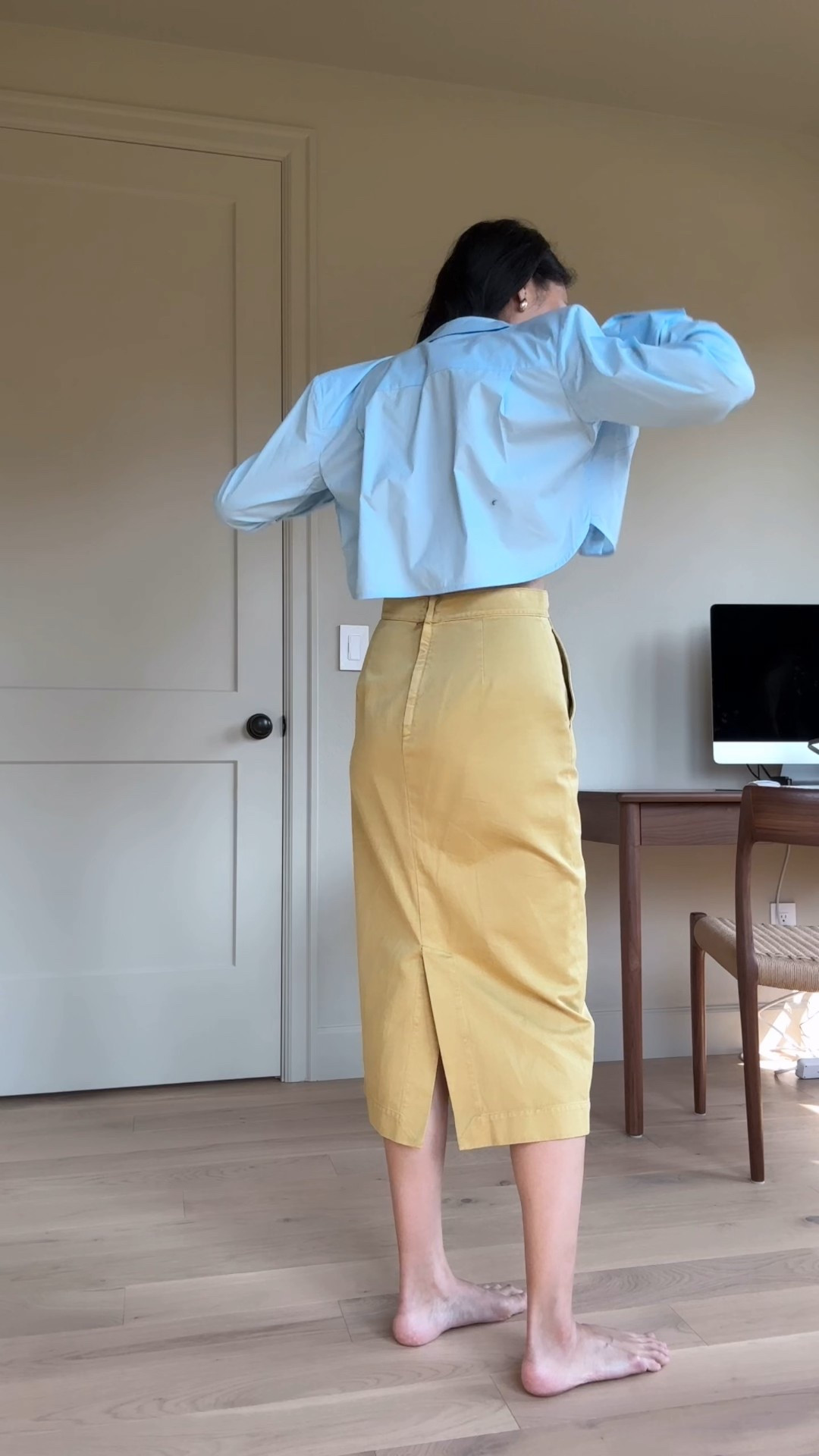 Balancing out a cropped shirt by buttoning up all the way! Linked to similar styles of shirt and skirt below!

#LTKStyleTip #LTKWorkwear