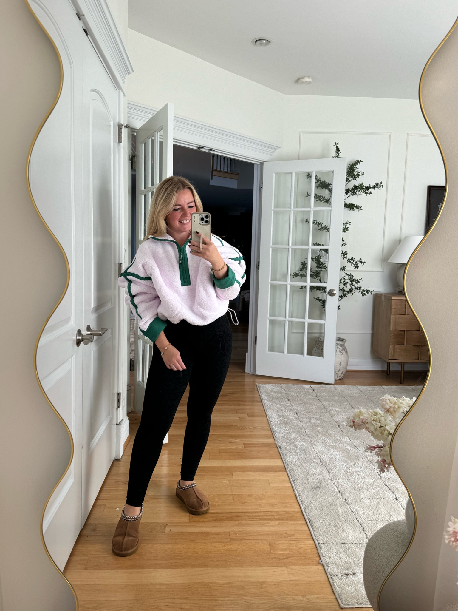 Obsessed with this FP top! I love that you can cinch the waist! Wearing my favorite Lululemon leggings too and UGG slippers! They would all make a great gift! #giftidea #giftguide #giftideas #giftsforher #outfit #falloutfit #traveloutfit 

#LTKCyberWeek #LTKGiftGuide #LTKTravel