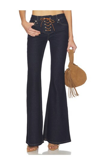 Alice + Olivia Delilah Flare Jean in Blue. - size 29 | Revolve Clothing (Global)