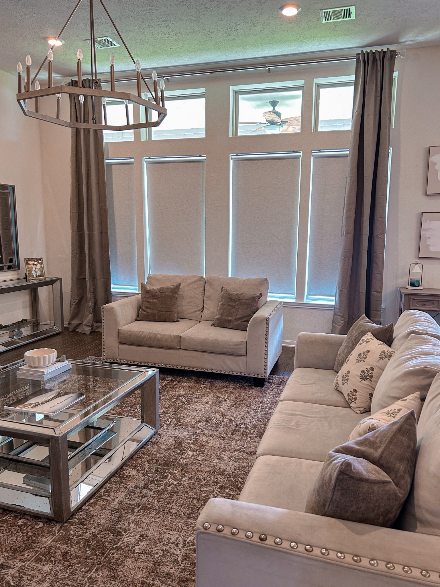 Changed our curtains, throw pillows, & rug & the house is ready for the BER months! 🤎

#LTKSeasonal