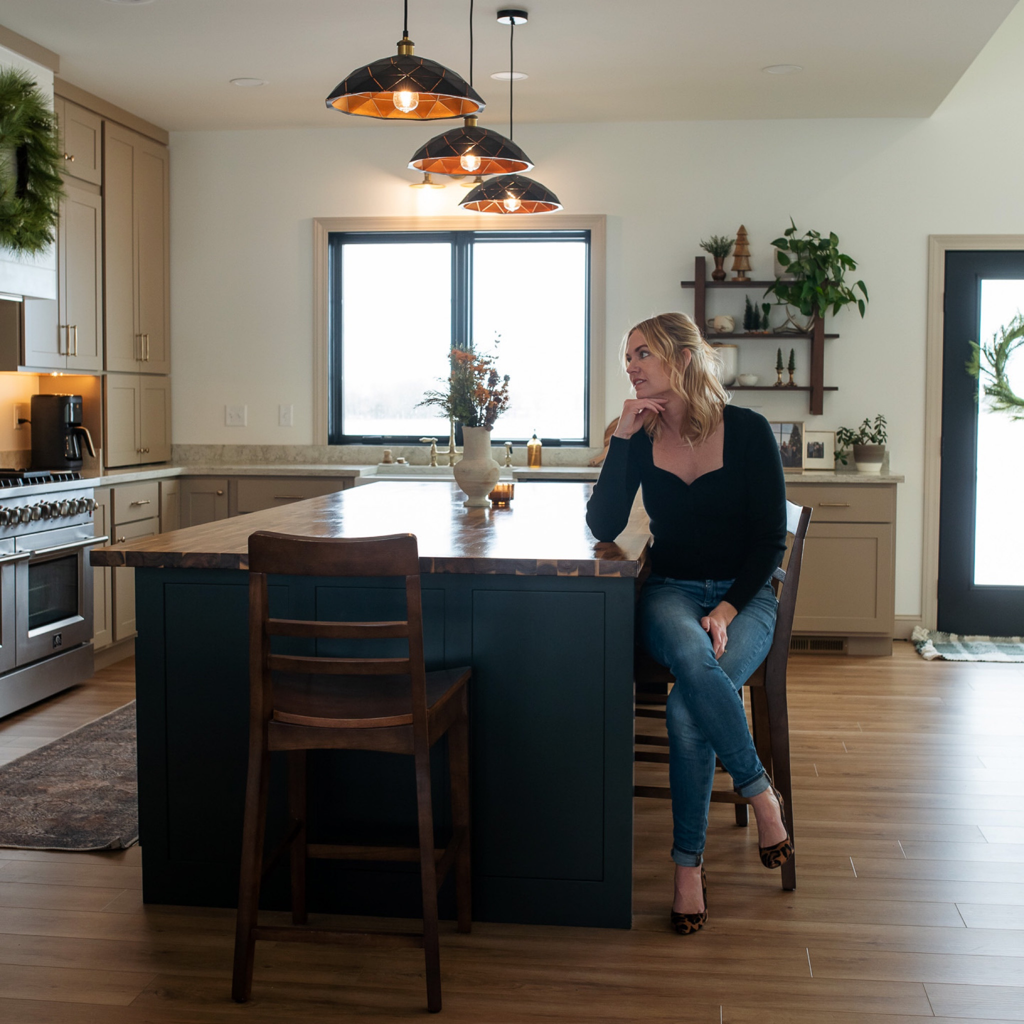 Farmhouse kitchen featuring a large dark green island, taupe cabinets, farmhouse sink and plenty of budget friendly finds! 

#LTKFind #LTKhome