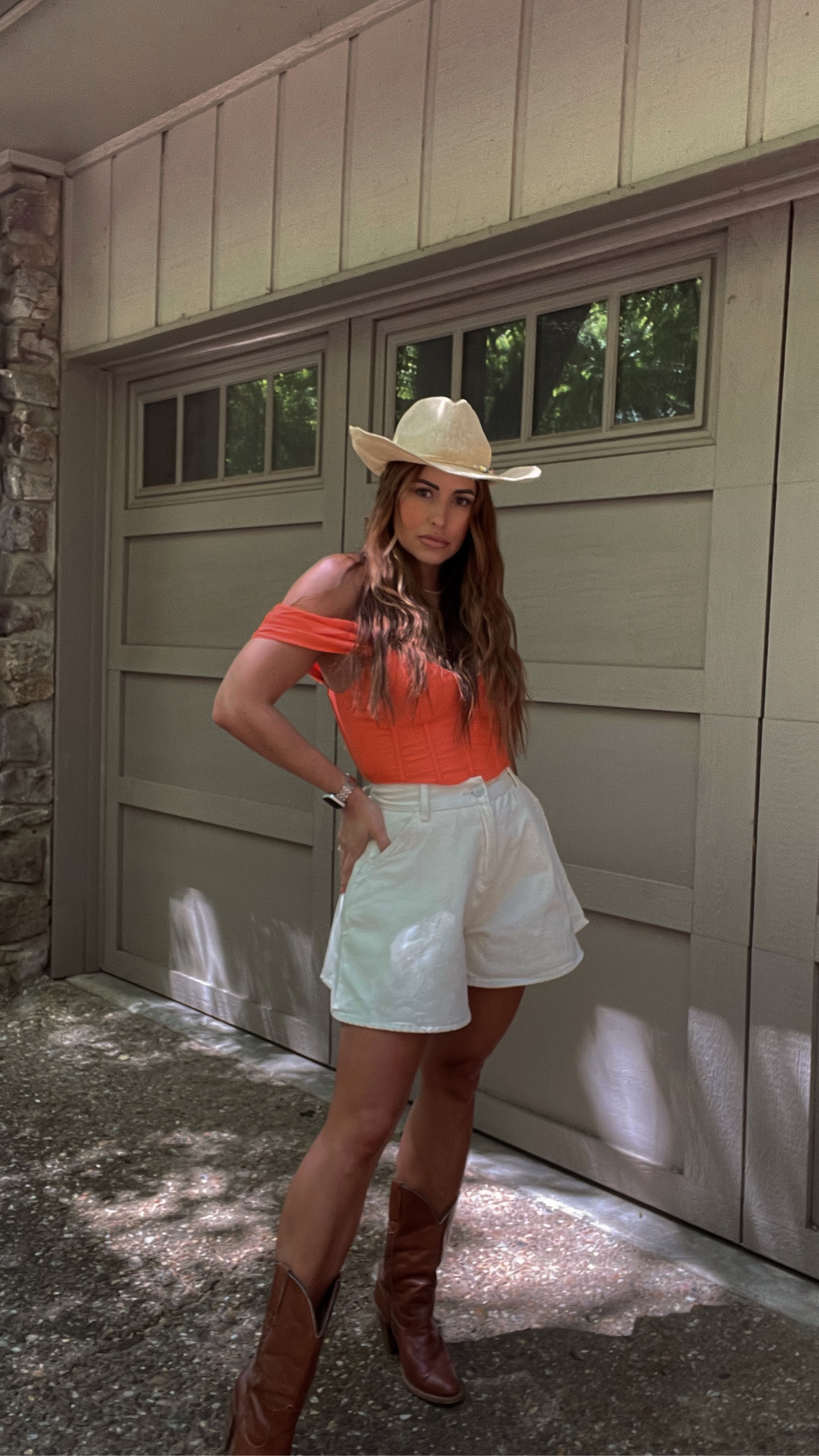 Coastal cowgirl! Corset, crop top, off the shoulder top. Cowgirl hat. Bermuda shorts  

#LTKFestival #LTKFind #LTKstyletip
