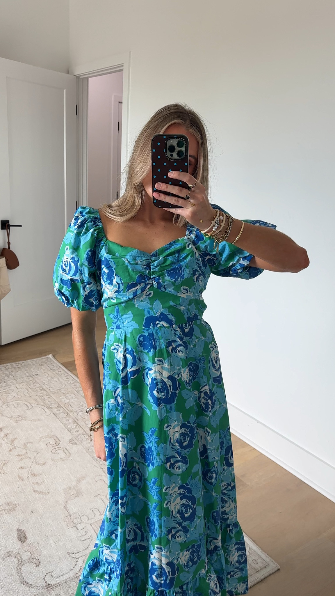@englishfactory size xs A bold expression of femininity, this floral maxi dress blends soft structure with romantic detail. Designed with a flattering fitted bodice and voluminous puff sleeves, it creates a balanced silhouette that feels both polished and effortless. The open back with a delicate tie adds an unexpected, elegant finish, while the flowing skirt enhances movement with every step. Vibrant yet refined, this piece transitions seamlessly from daytime occasions to evening moments.

#LTKSeasonal #LTKootd #LTKWedding