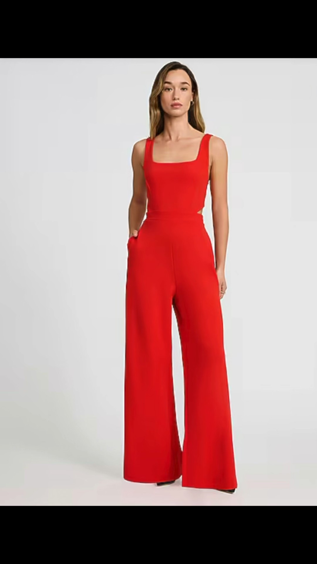 A sleek jumpsuit with cutout sides. Perfect for Valentine’s Day! 

#romper 
#jumpsuit
#redjumsuit 
#valentinedayoutfit
#valentineday 
#red 

#LTKOver40 #LTKSeasonal #LTKValentine